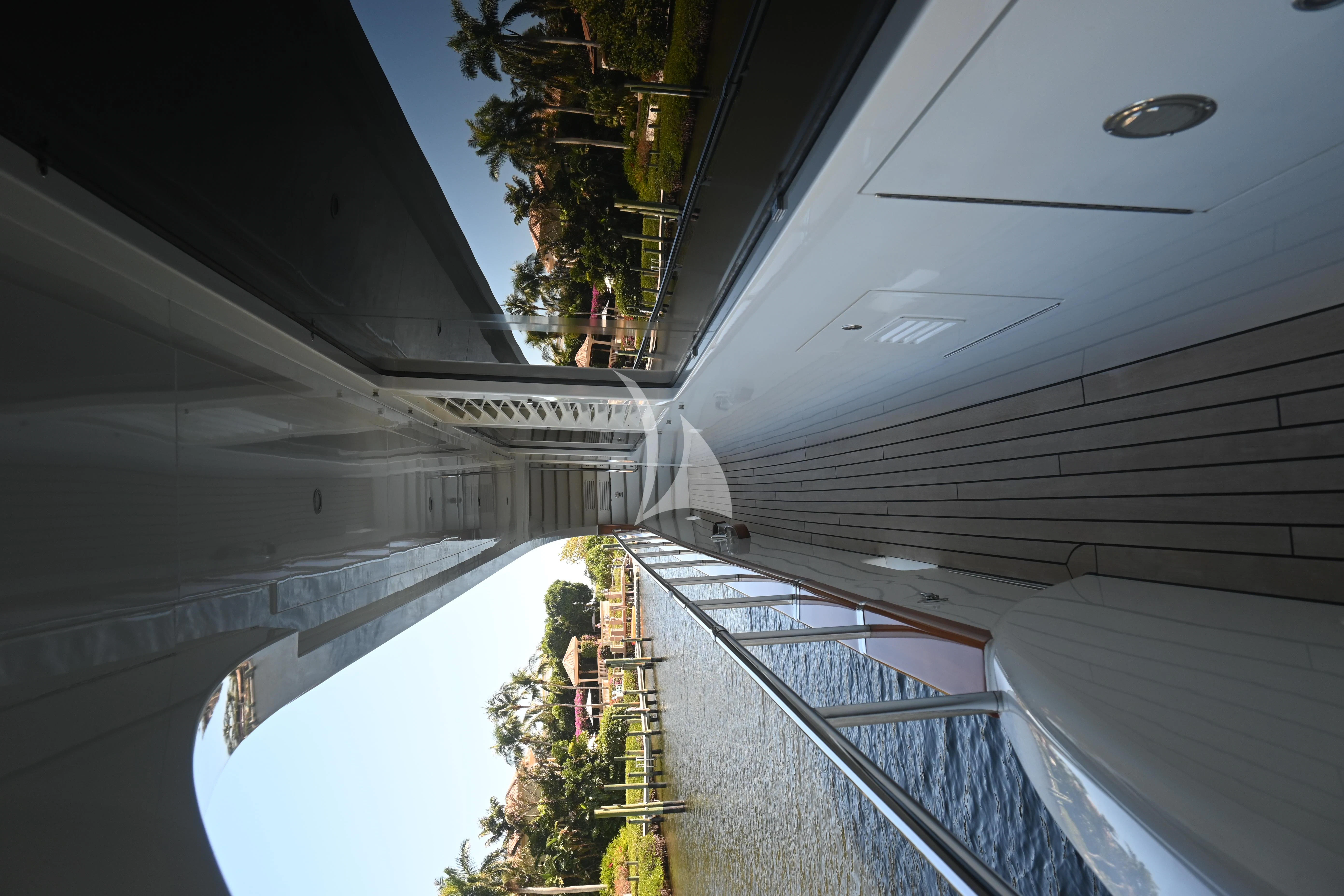 a plane wing with a city below aboard KIMBERLIE Yacht for Sale