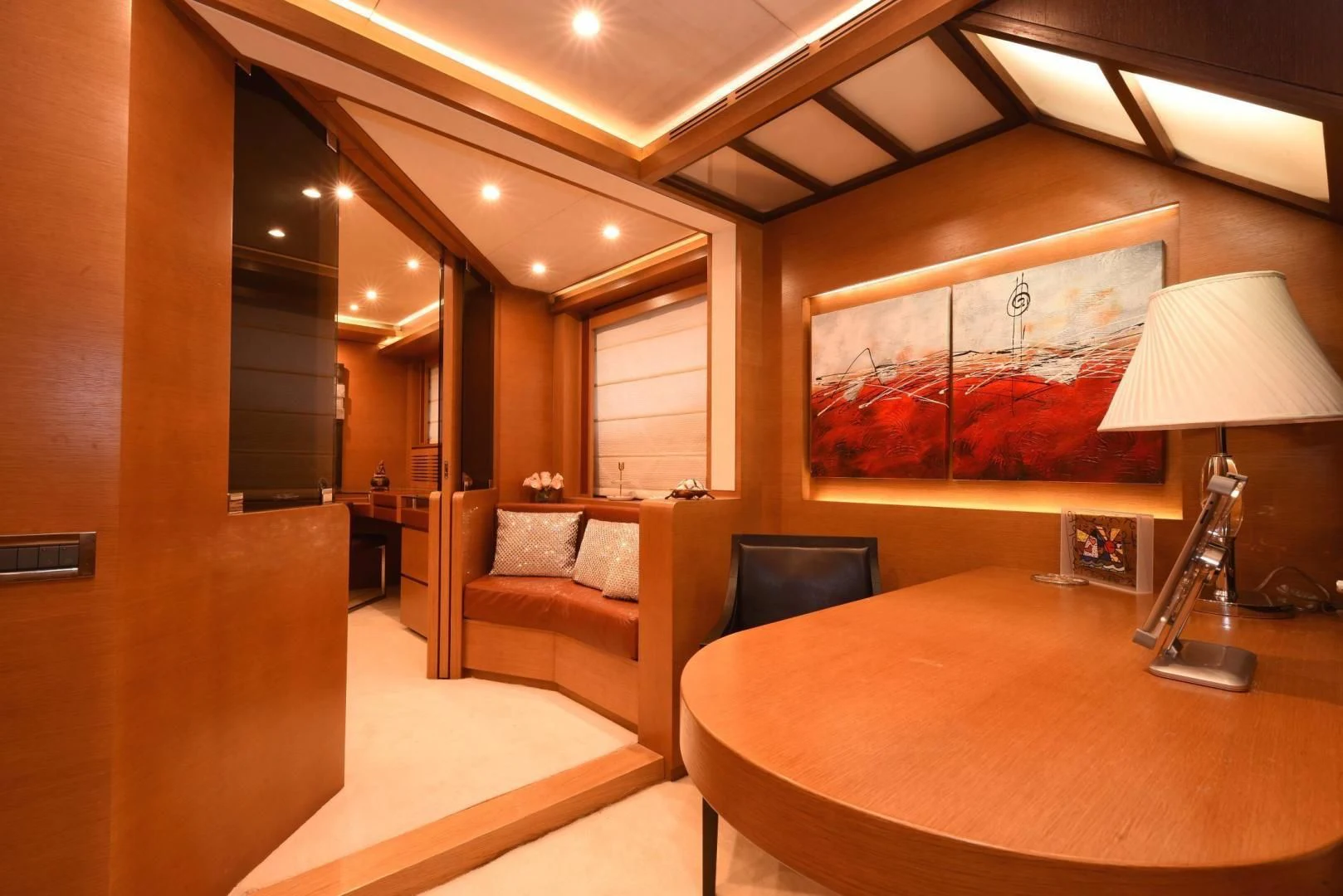 a room with a table and a couch aboard KIMBERLIE Yacht for Sale