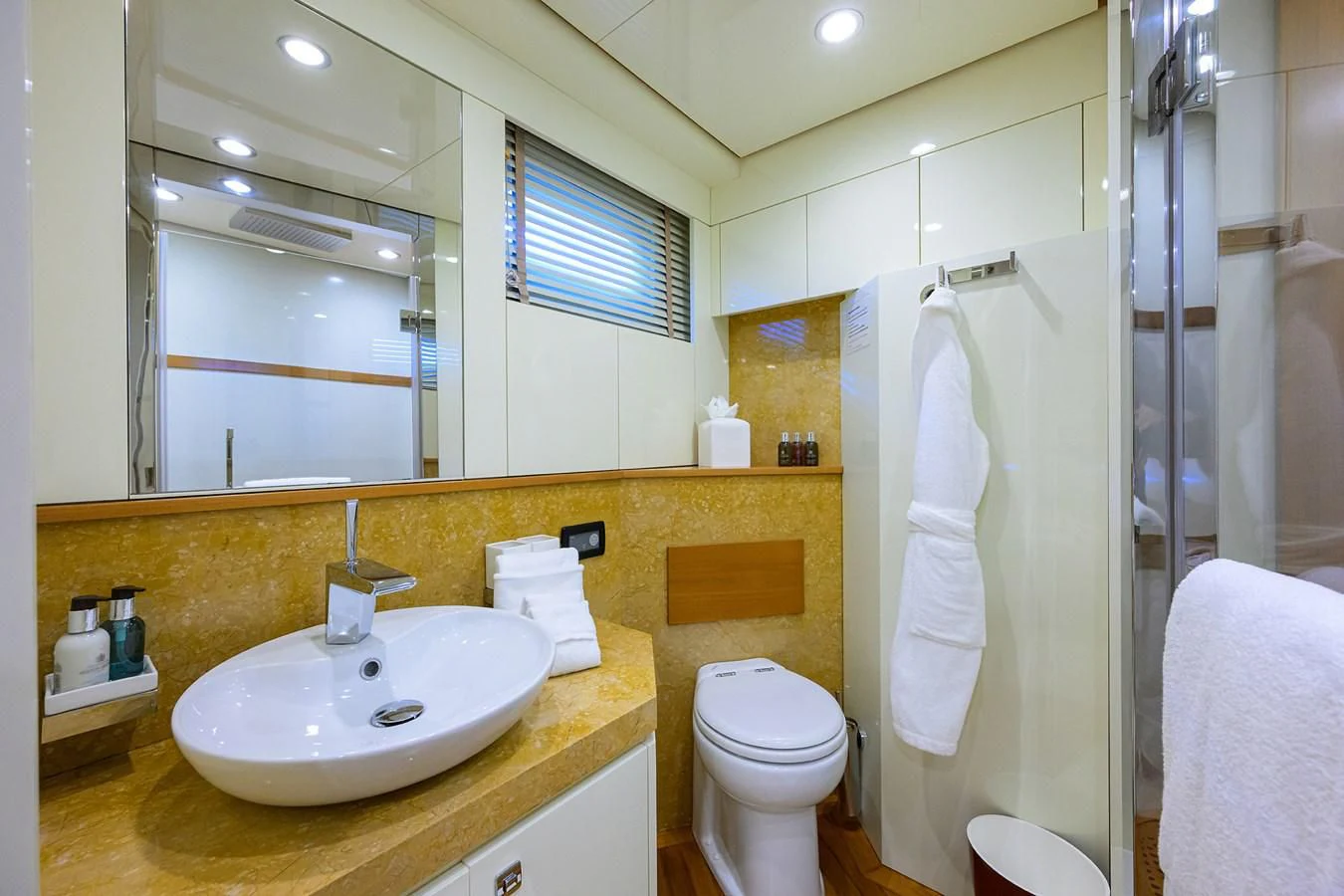a bathroom with a sink and toilet aboard KIMBERLIE Yacht for Sale