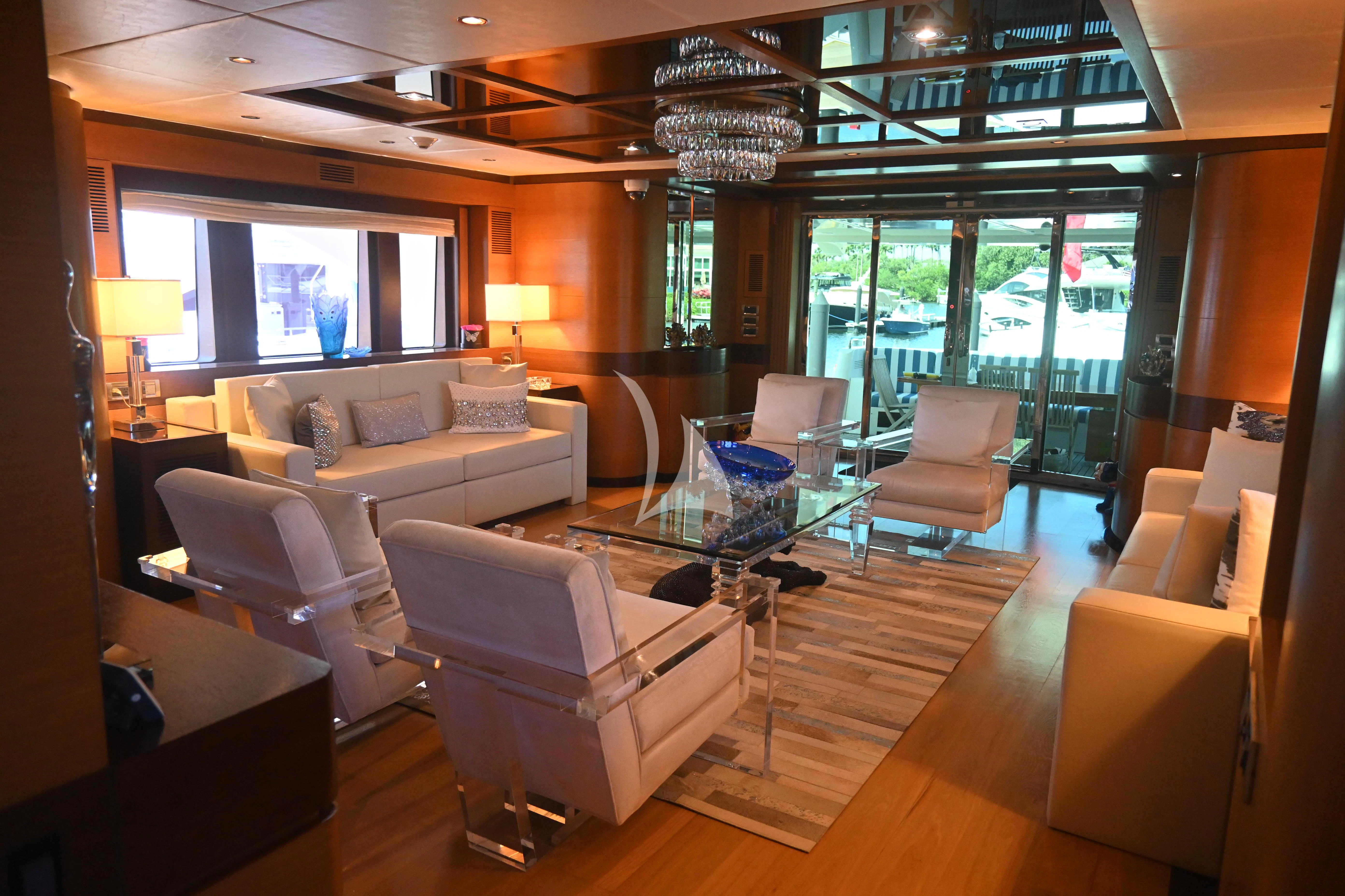 a living room with a large window aboard KIMBERLIE Yacht for Sale