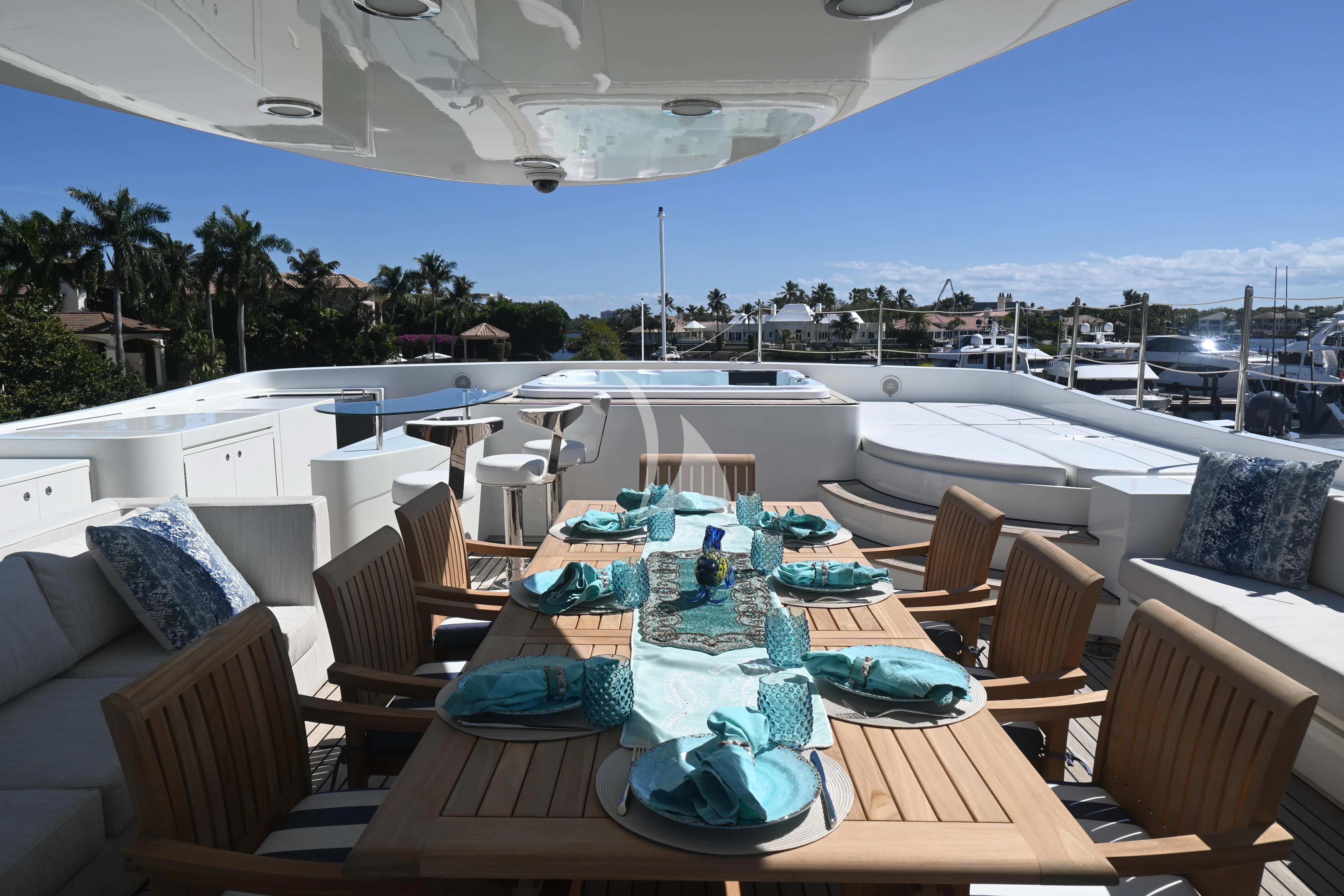 a large patio with a pool aboard KIMBERLIE Yacht for Sale