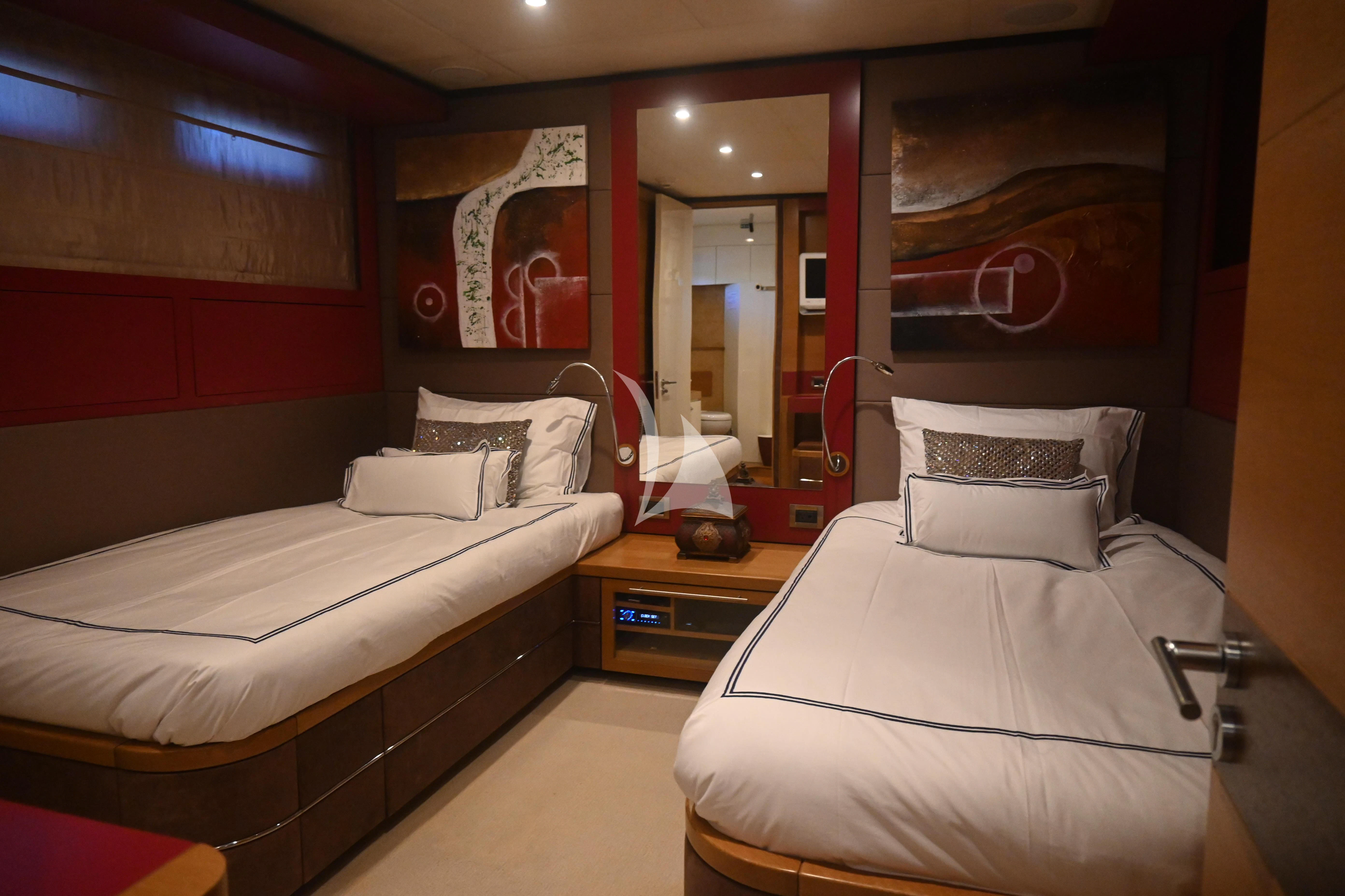 a room with two beds aboard KIMBERLIE Yacht for Sale