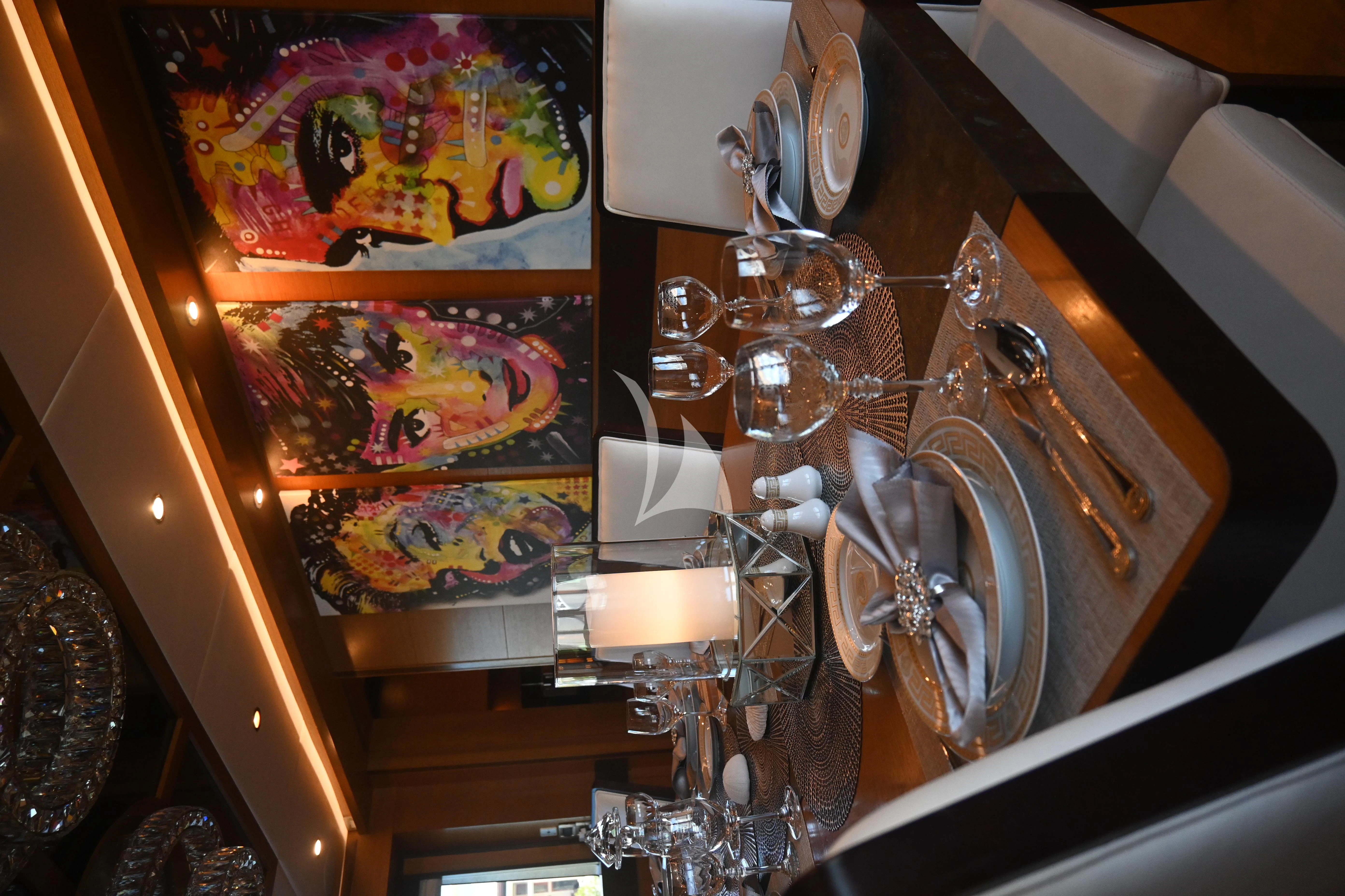 a room with a painting on the wall aboard KIMBERLIE Yacht for Sale