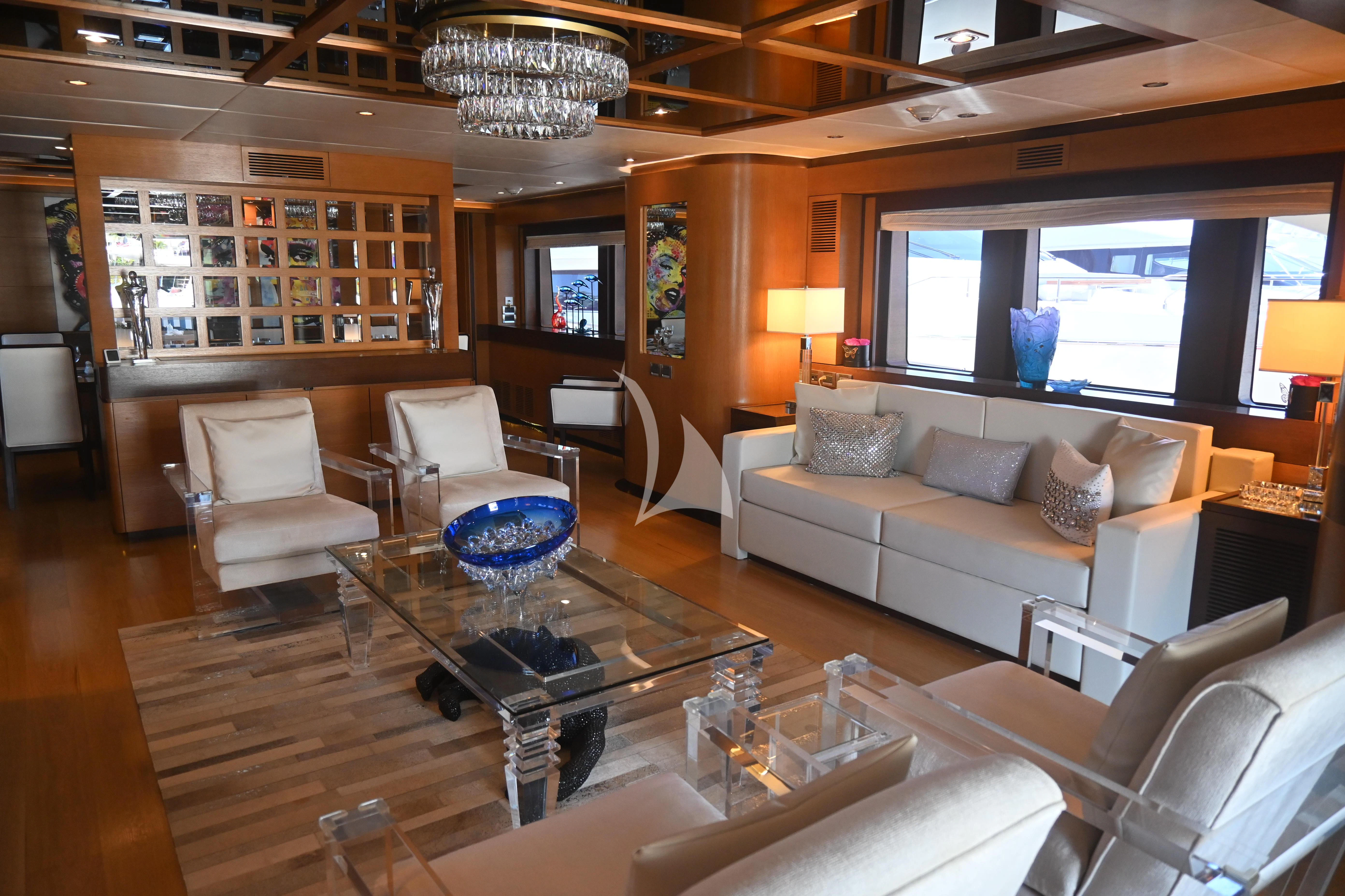 a living room with a large fireplace aboard KIMBERLIE Yacht for Sale
