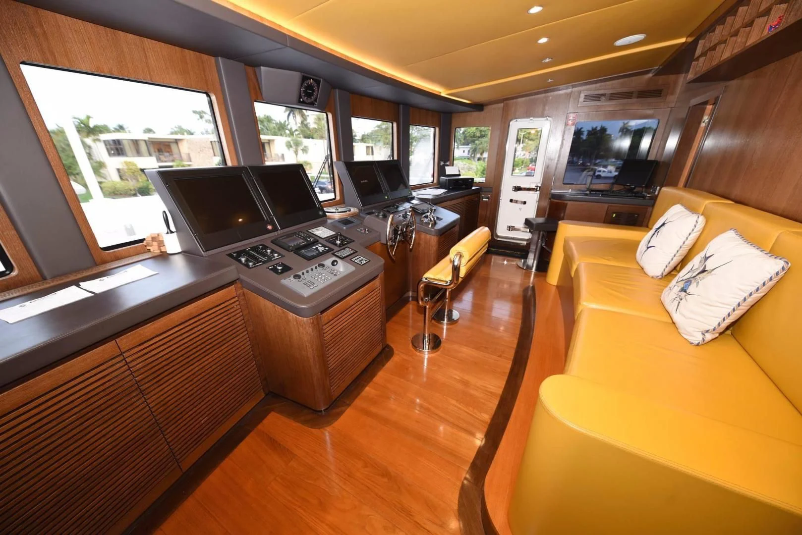 a living room with a large window aboard KIMBERLIE Yacht for Sale