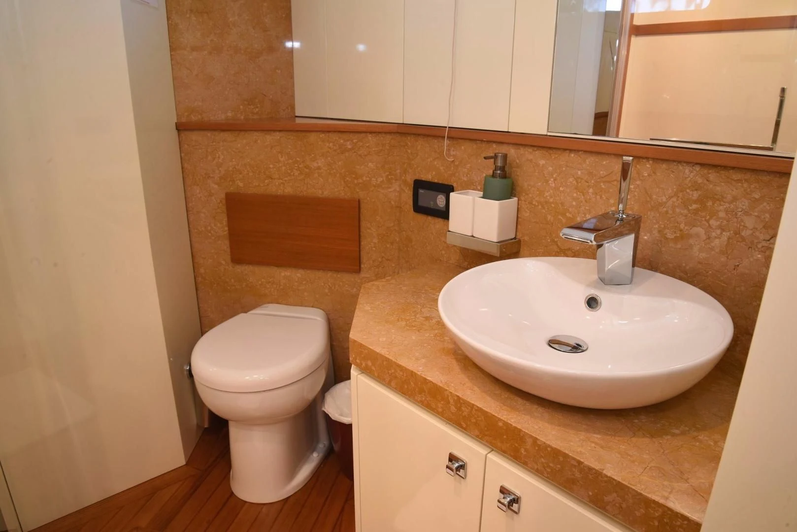 a bathroom with a sink and toilet aboard KIMBERLIE Yacht for Sale