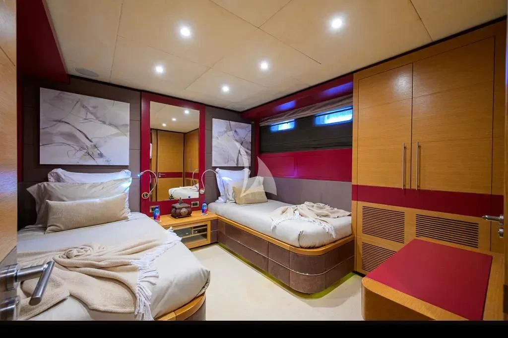 a room with two beds aboard KIMBERLIE Yacht for Sale