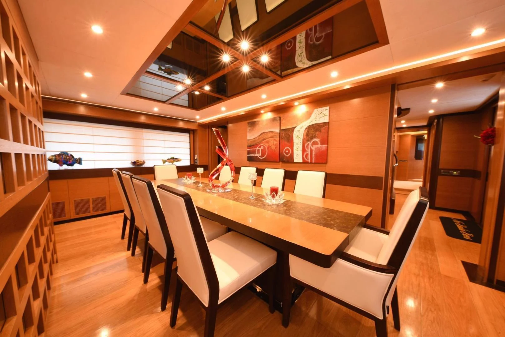 a room with a table and chairs aboard KIMBERLIE Yacht for Sale