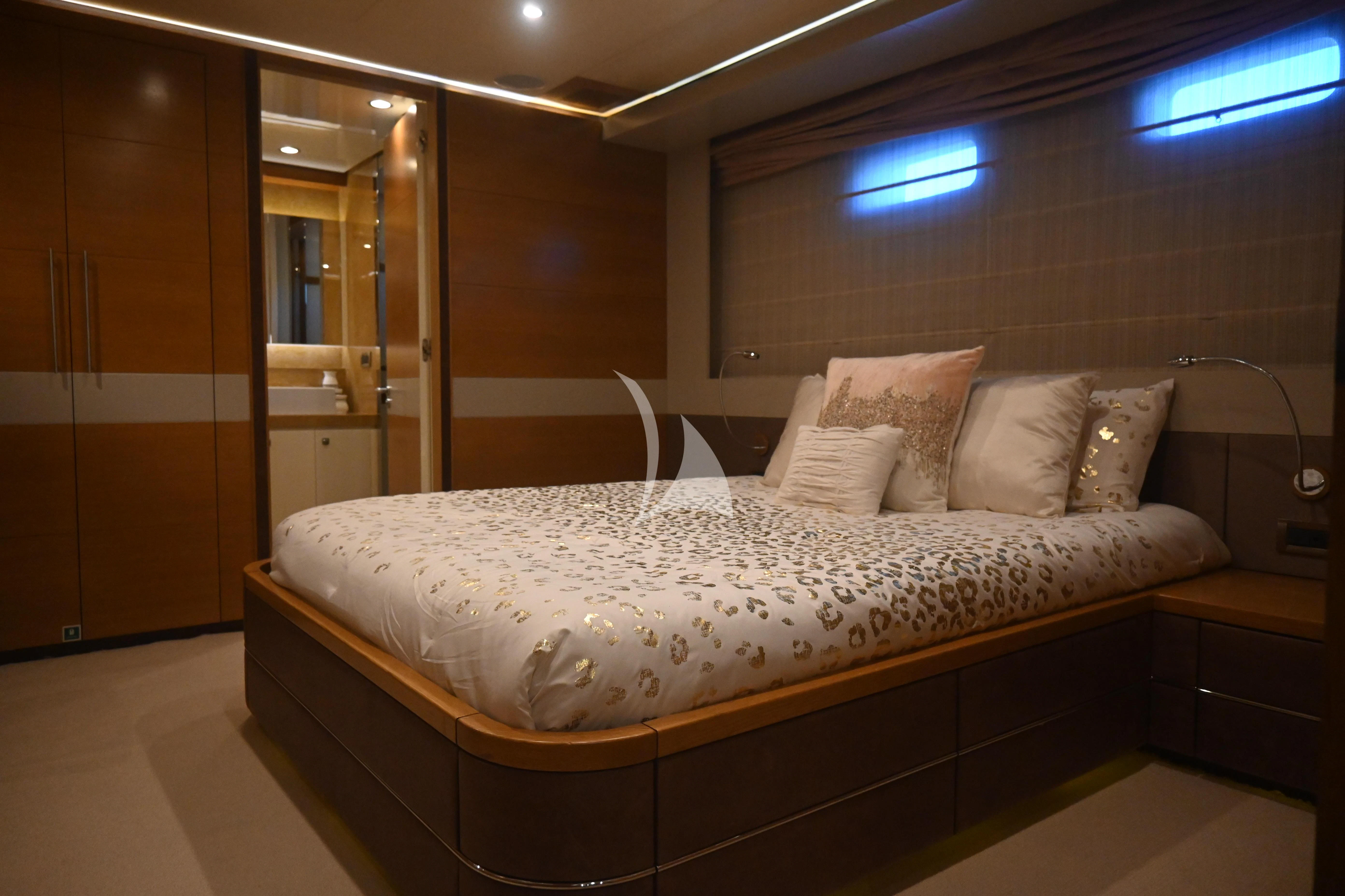 a bed with white pillows aboard KIMBERLIE Yacht for Sale