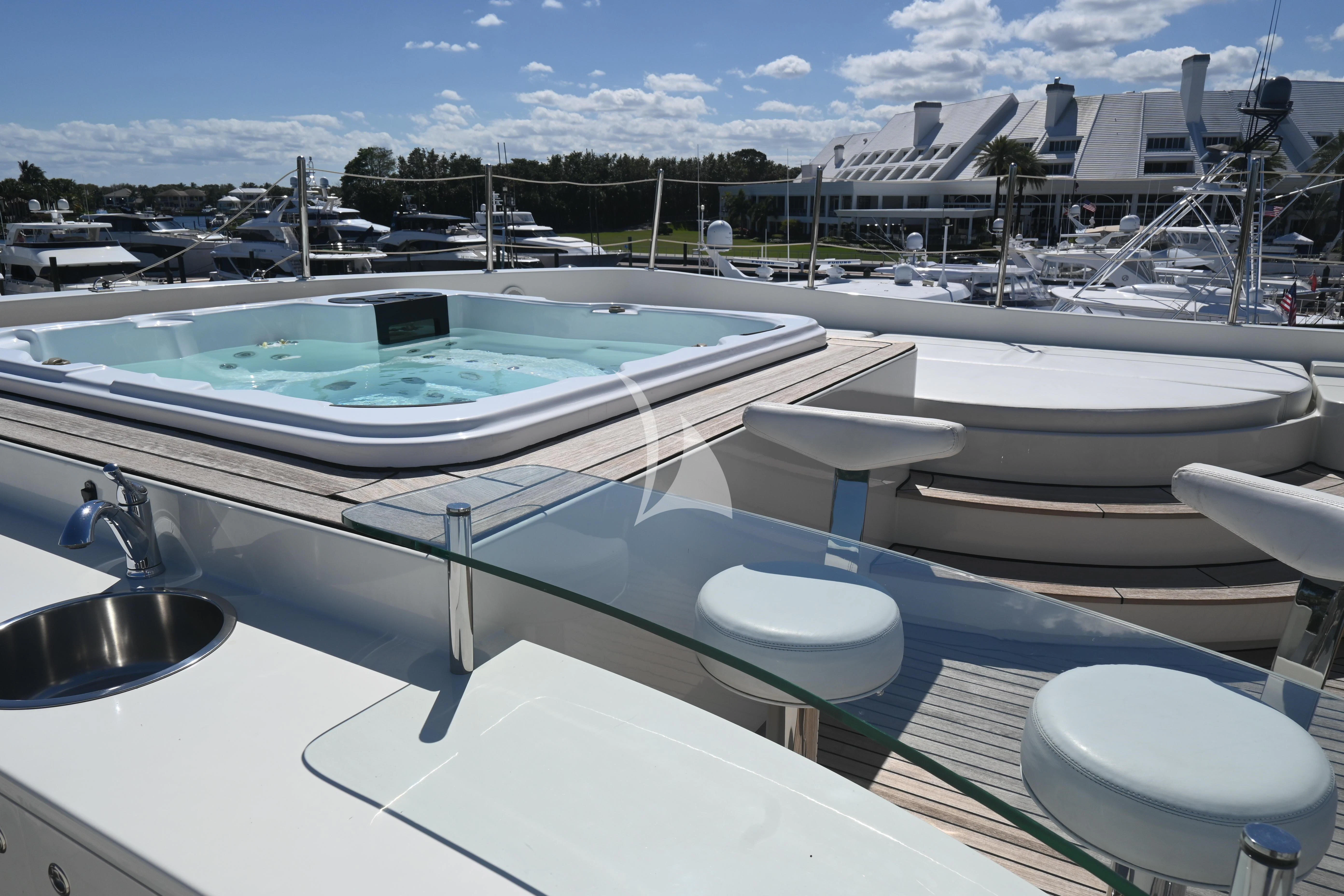 a swimming pool with a group of boats in it aboard KIMBERLIE Yacht for Sale