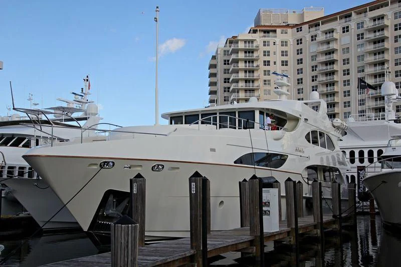 a large white boat docked aboard KIMBERLIE Yacht for Sale