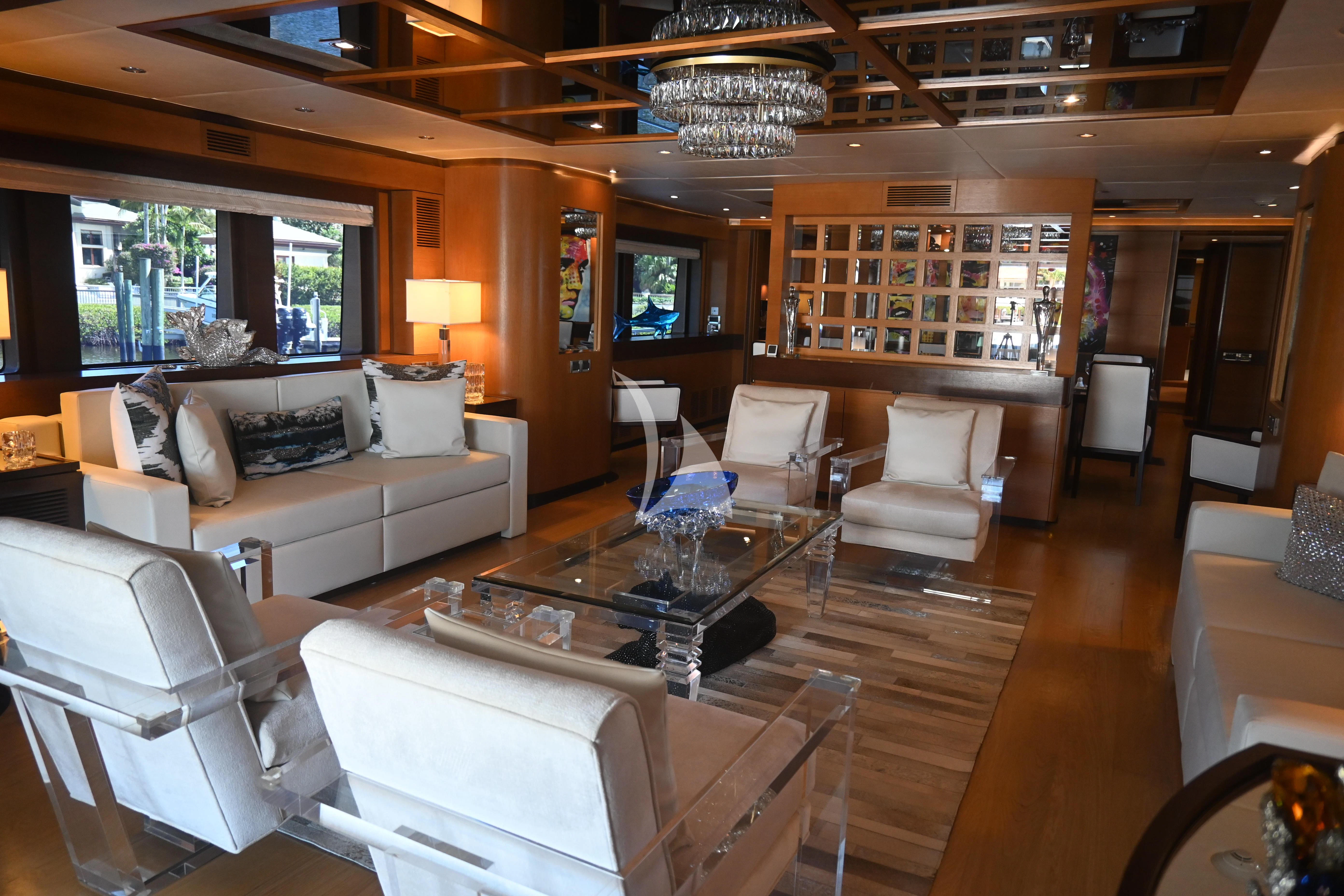a living room with a large window aboard KIMBERLIE Yacht for Sale