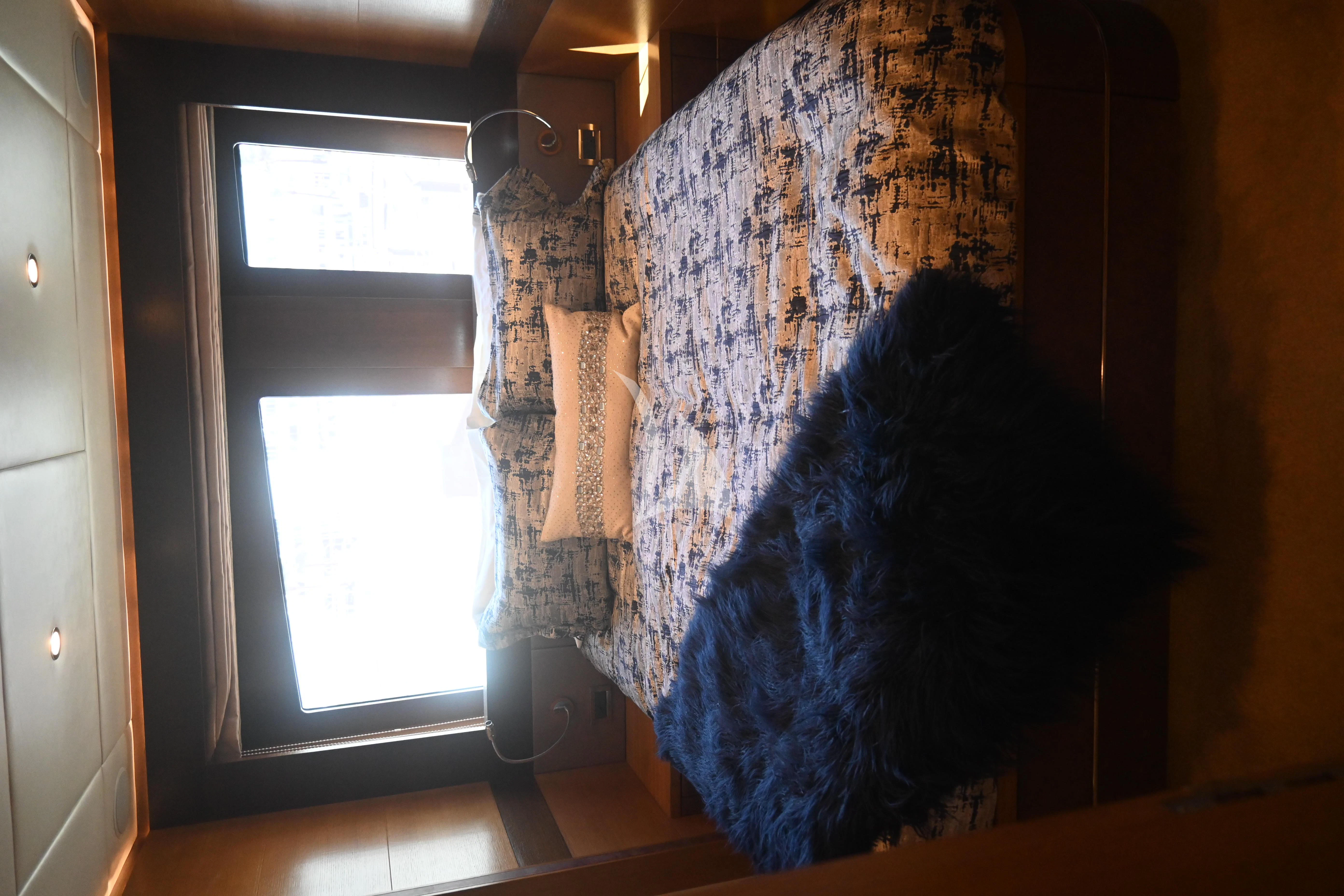 a dog looking out a window aboard KIMBERLIE Yacht for Sale