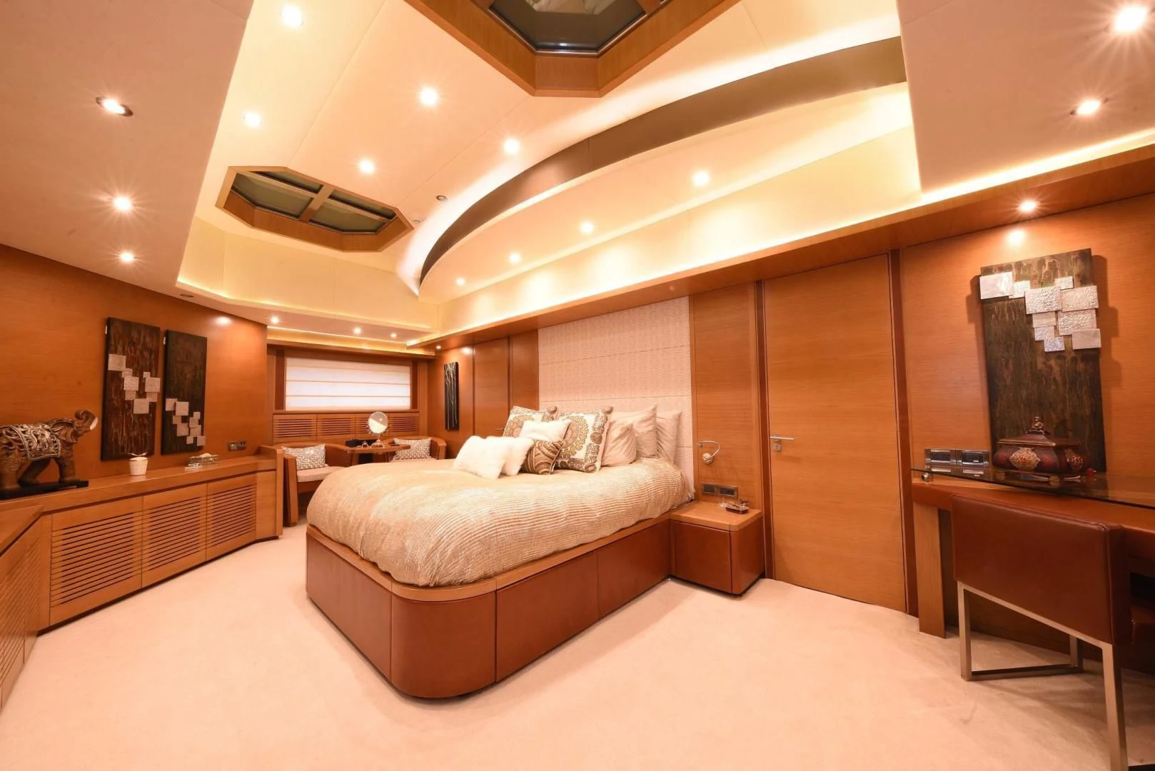 a large bedroom with a bed aboard KIMBERLIE Yacht for Sale