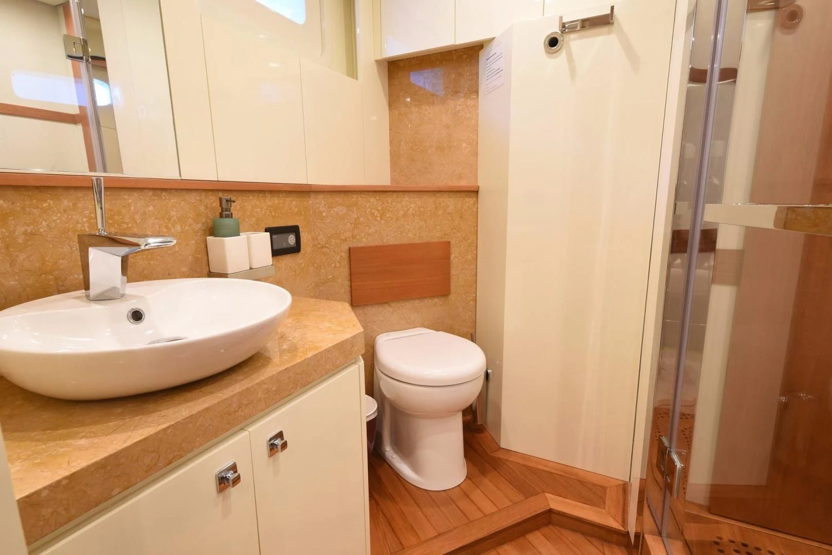 a bathroom with a sink and a toilet aboard KIMBERLIE Yacht for Sale