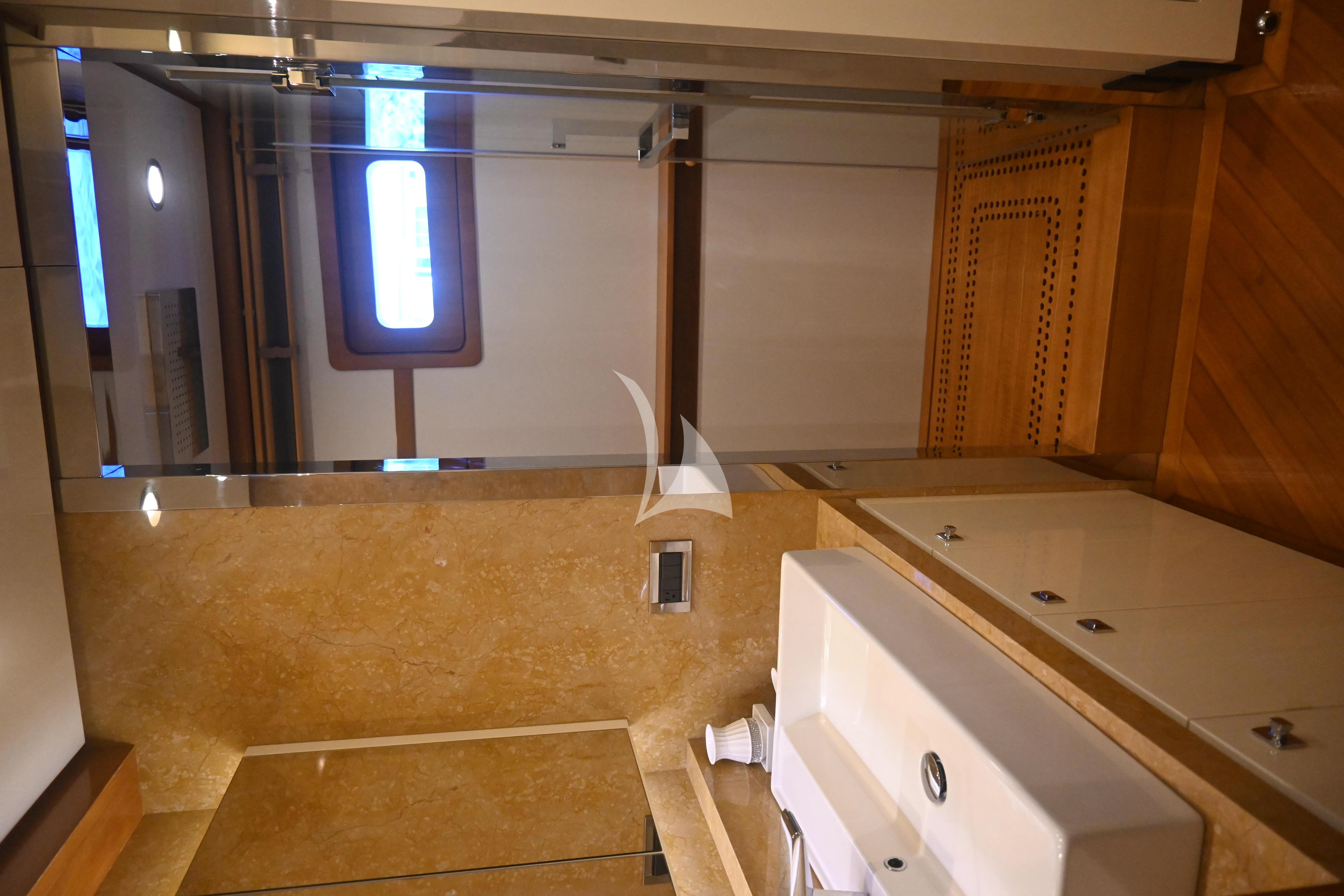 a room with a window and cabinets aboard KIMBERLIE Yacht for Sale