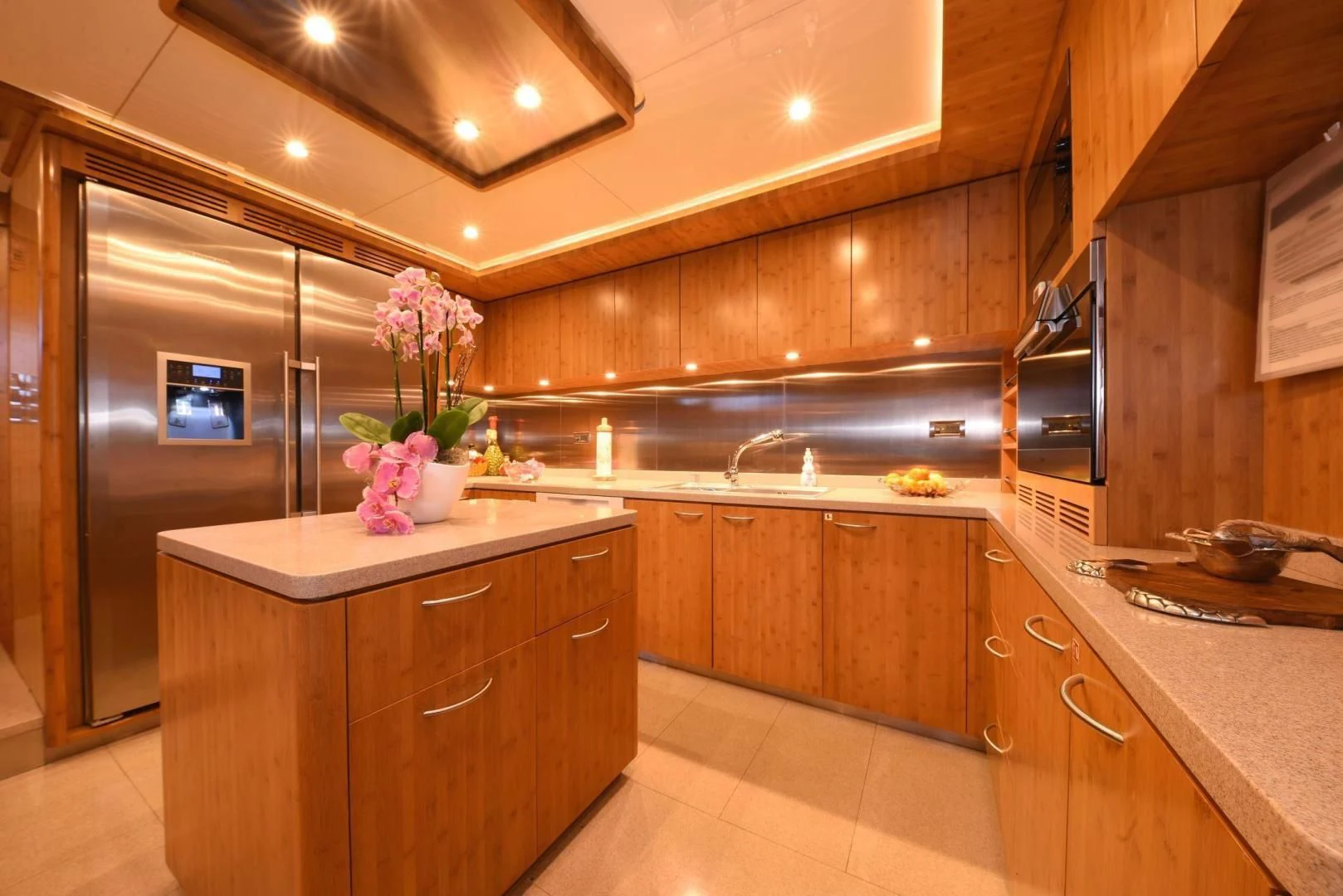 a kitchen with a refrigerator and a sink aboard KIMBERLIE Yacht for Sale