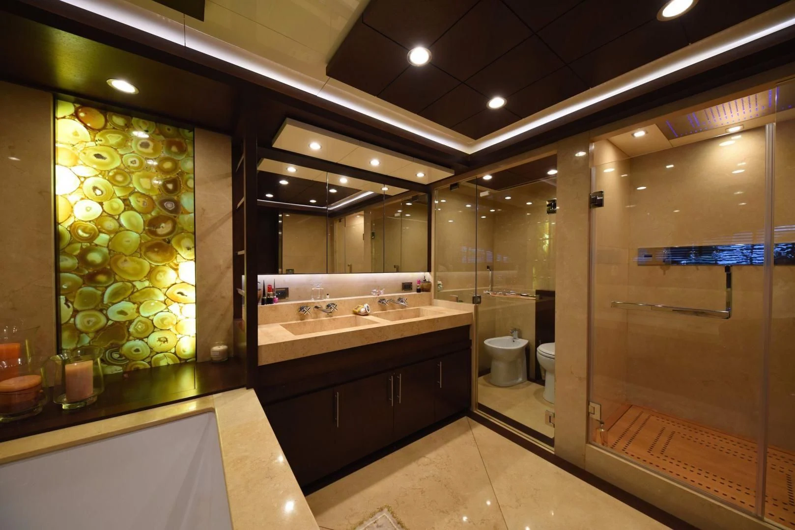 a bathroom with a large mirror aboard KIMBERLIE Yacht for Sale