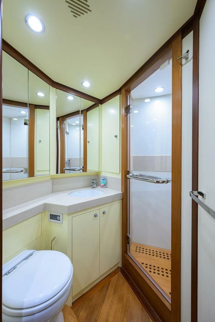 a bathroom with a toilet and sink aboard KIMBERLIE Yacht for Sale