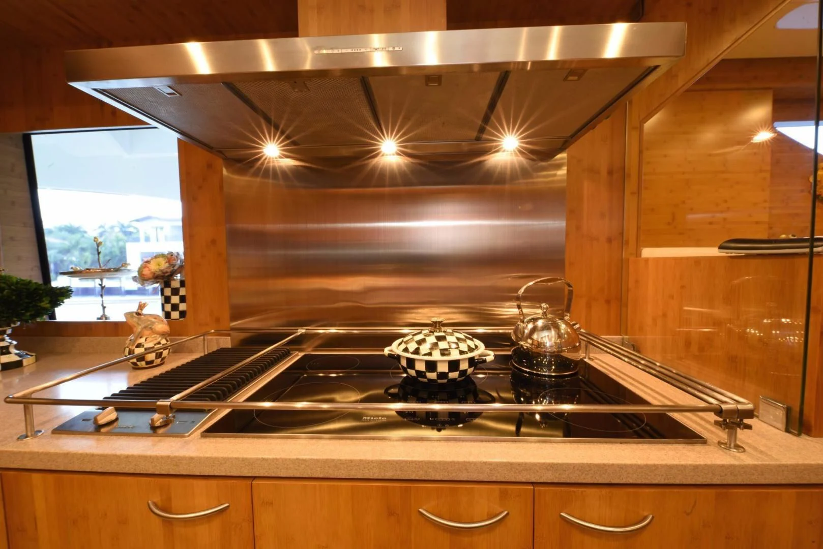 a kitchen with a stove and a window aboard KIMBERLIE Yacht for Sale
