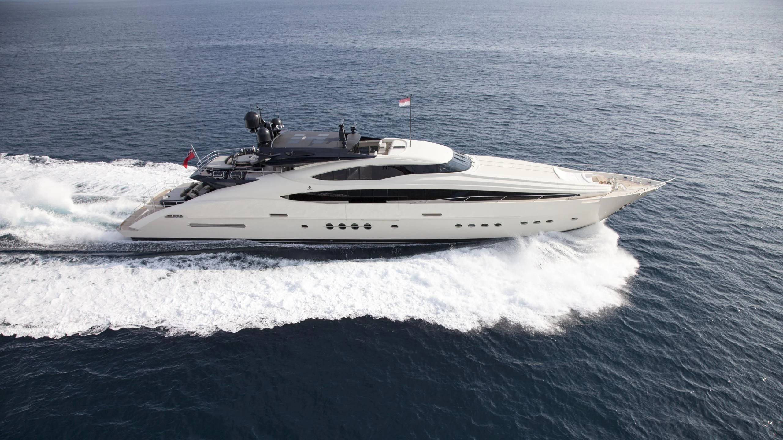 a white boat on the water aboard STEALTH Yacht for Sale