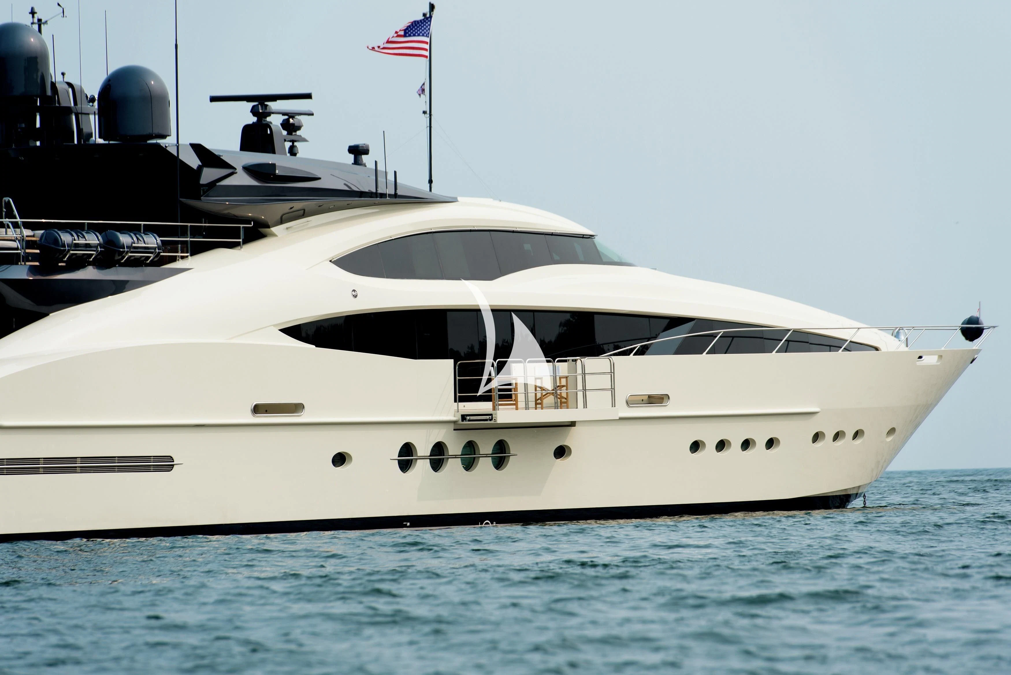 a white yacht on the water aboard STEALTH Yacht for Sale