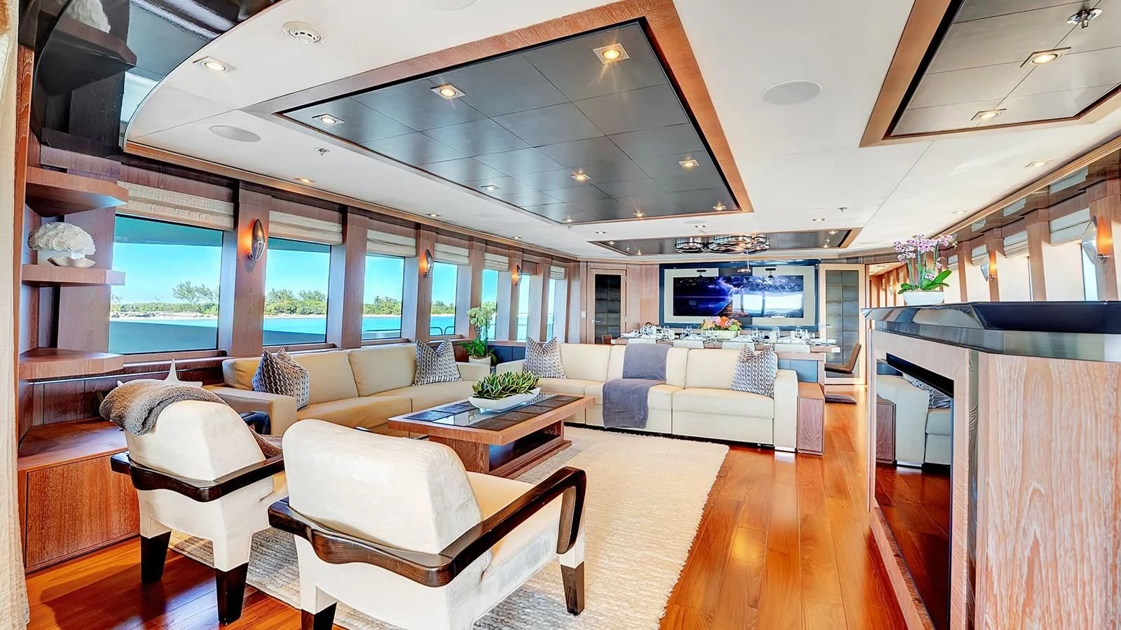 a living room with a large open window aboard STEALTH Yacht for Sale