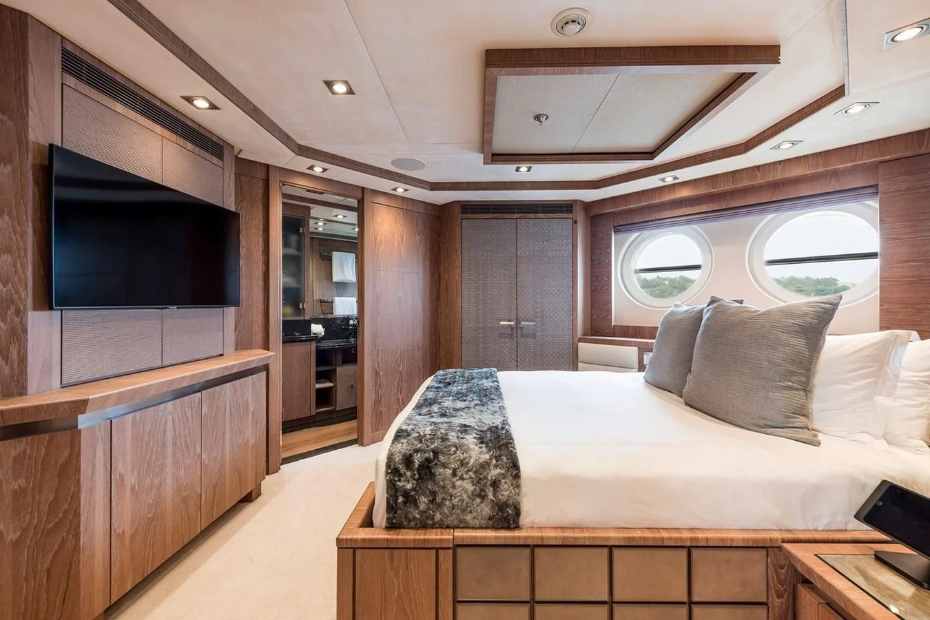 a bed in a room aboard STEALTH Yacht for Sale