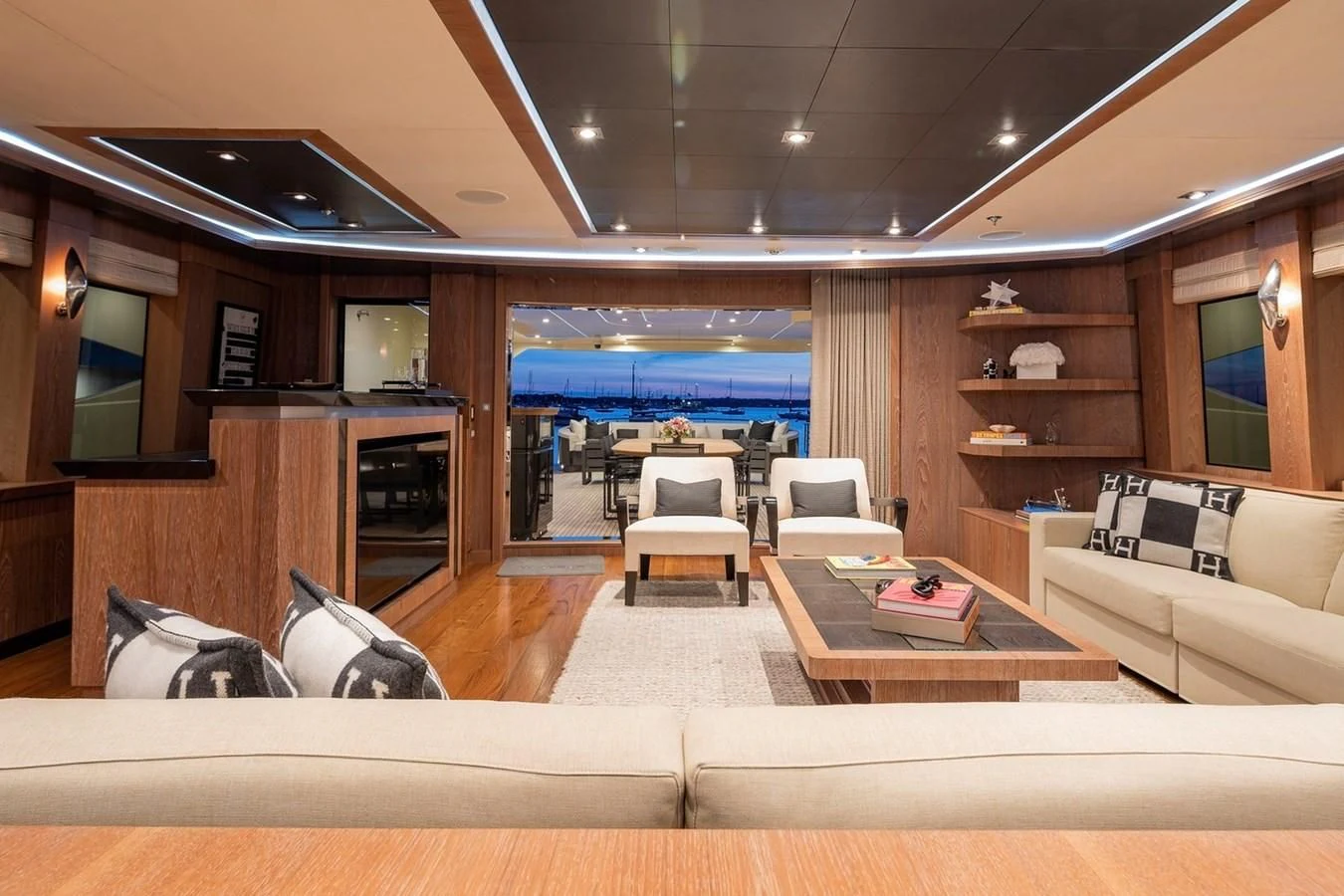a living room with a large window aboard STEALTH Yacht for Sale