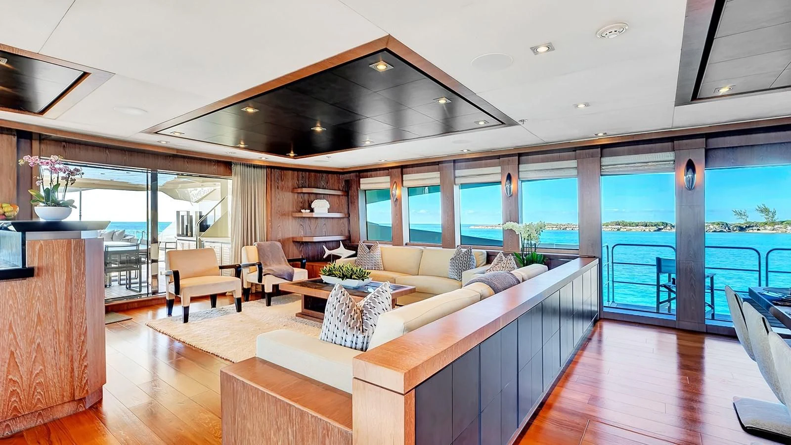 a living room with a large window aboard STEALTH Yacht for Sale