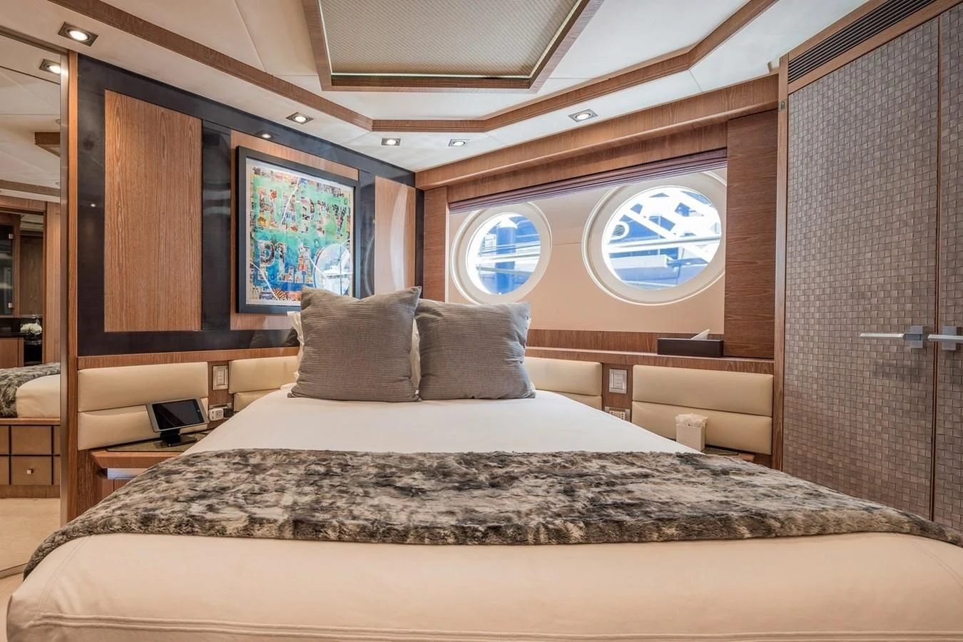 a bed with a large bed aboard STEALTH Yacht for Sale