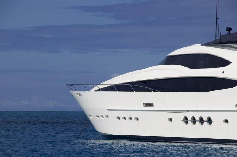 a white yacht in the water aboard STEALTH Yacht for Sale