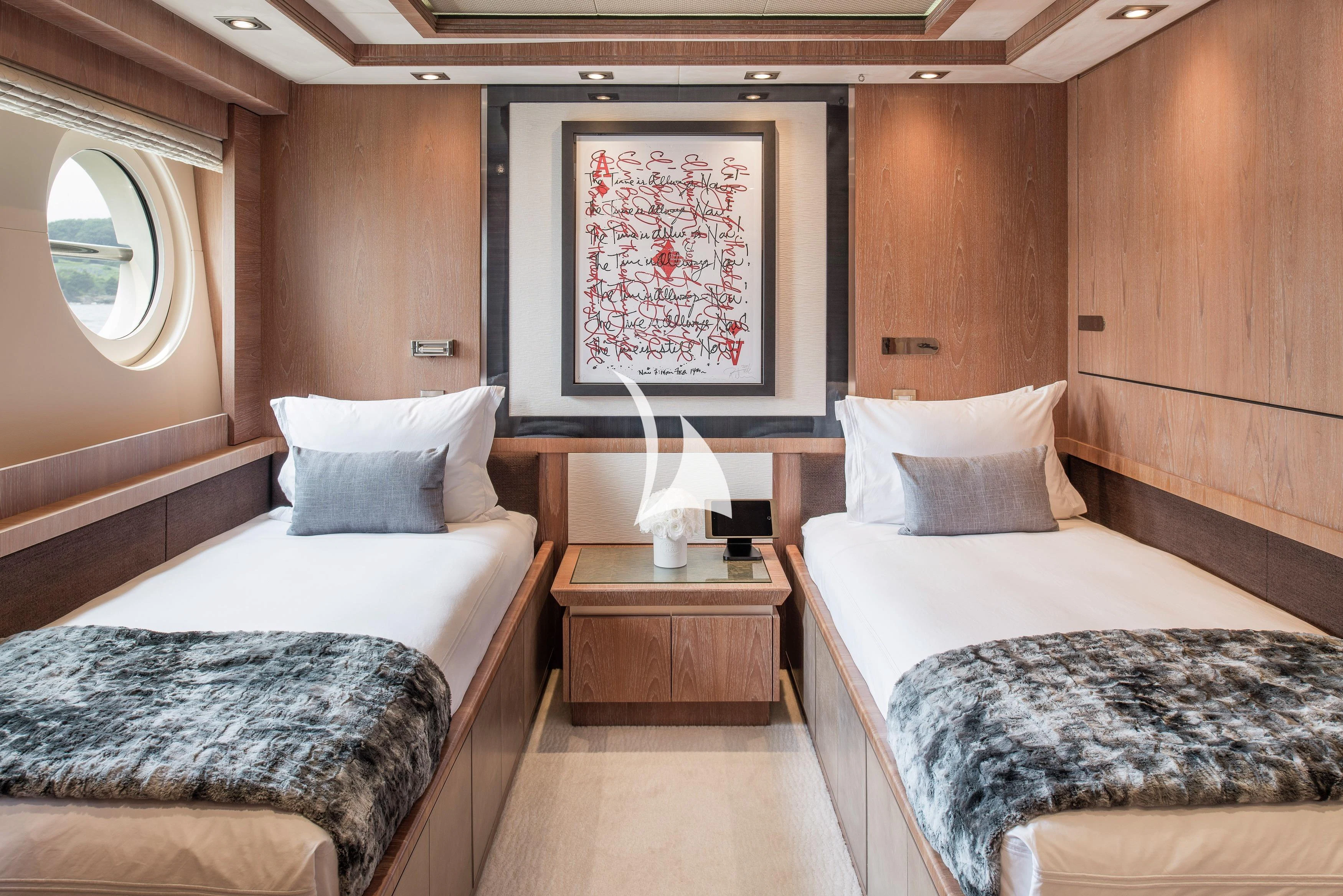 a couple of beds in a room aboard STEALTH Yacht for Sale