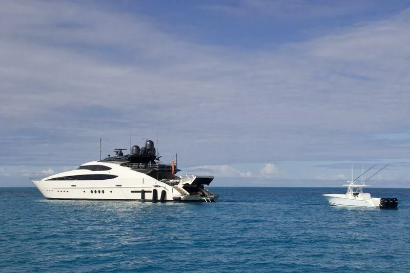a boat and a boat in the water aboard STEALTH Yacht for Sale