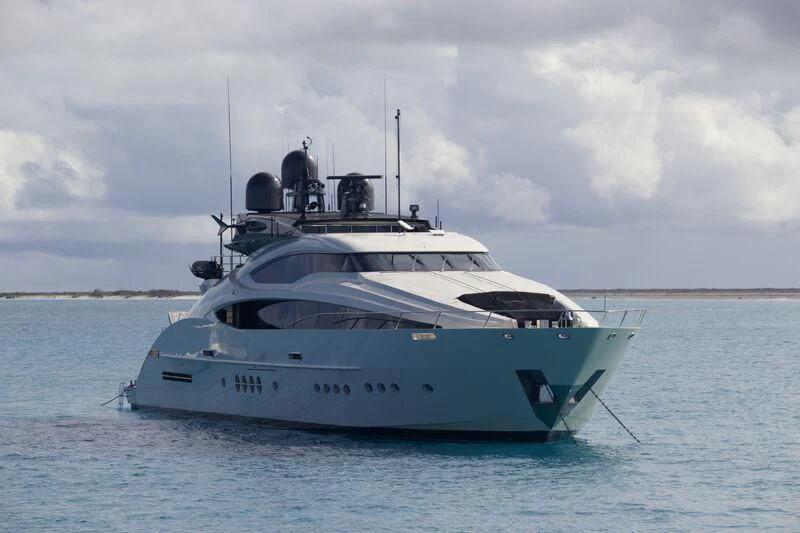 a white yacht in the water aboard STEALTH Yacht for Sale
