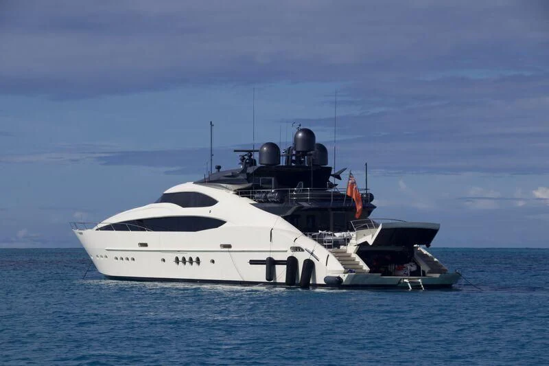 a white yacht in the water aboard STEALTH Yacht for Sale