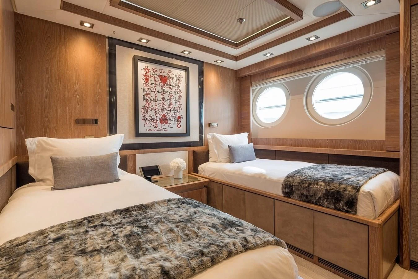 a couple of beds in a room aboard STEALTH Yacht for Sale