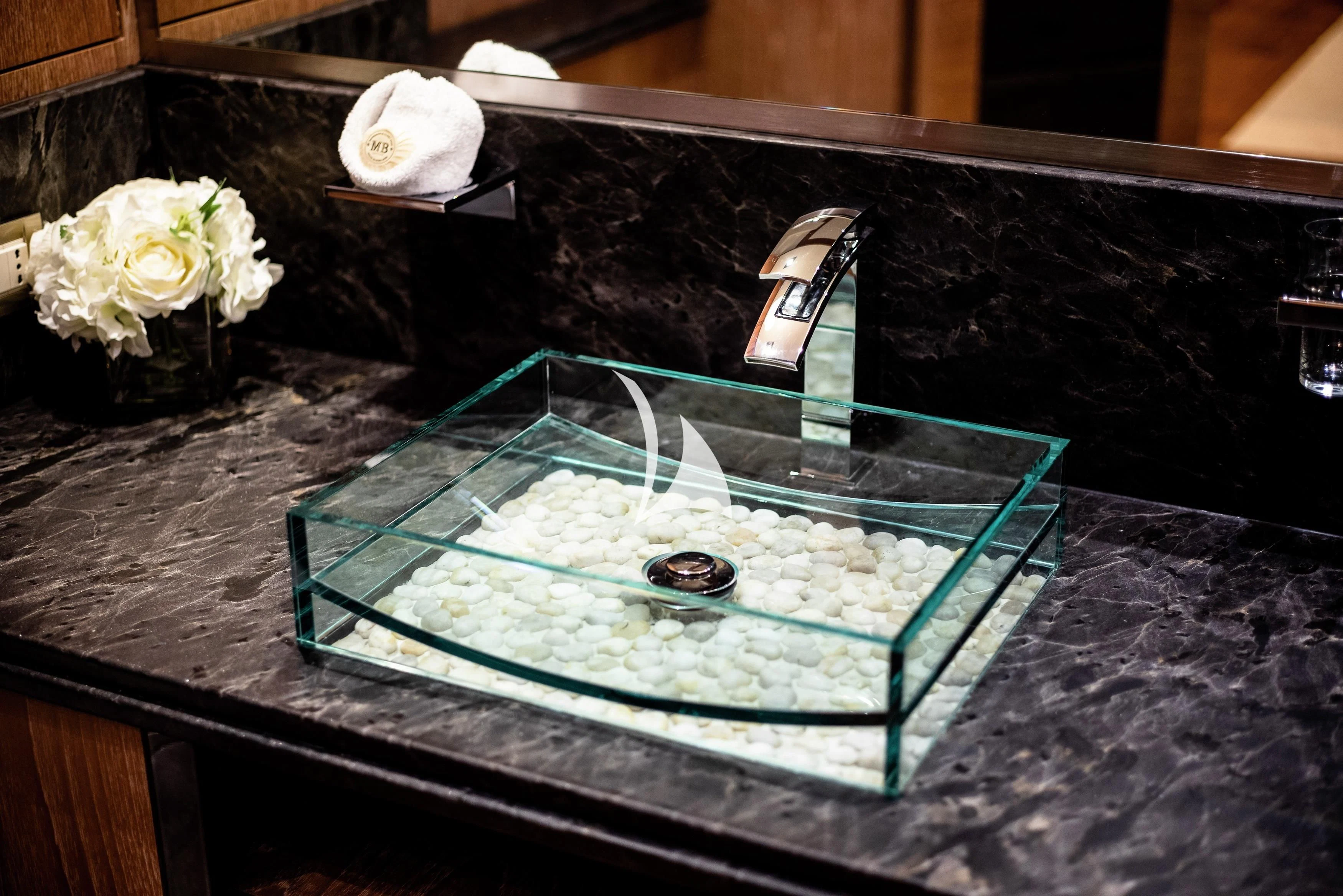 a cake on a table aboard STEALTH Yacht for Sale