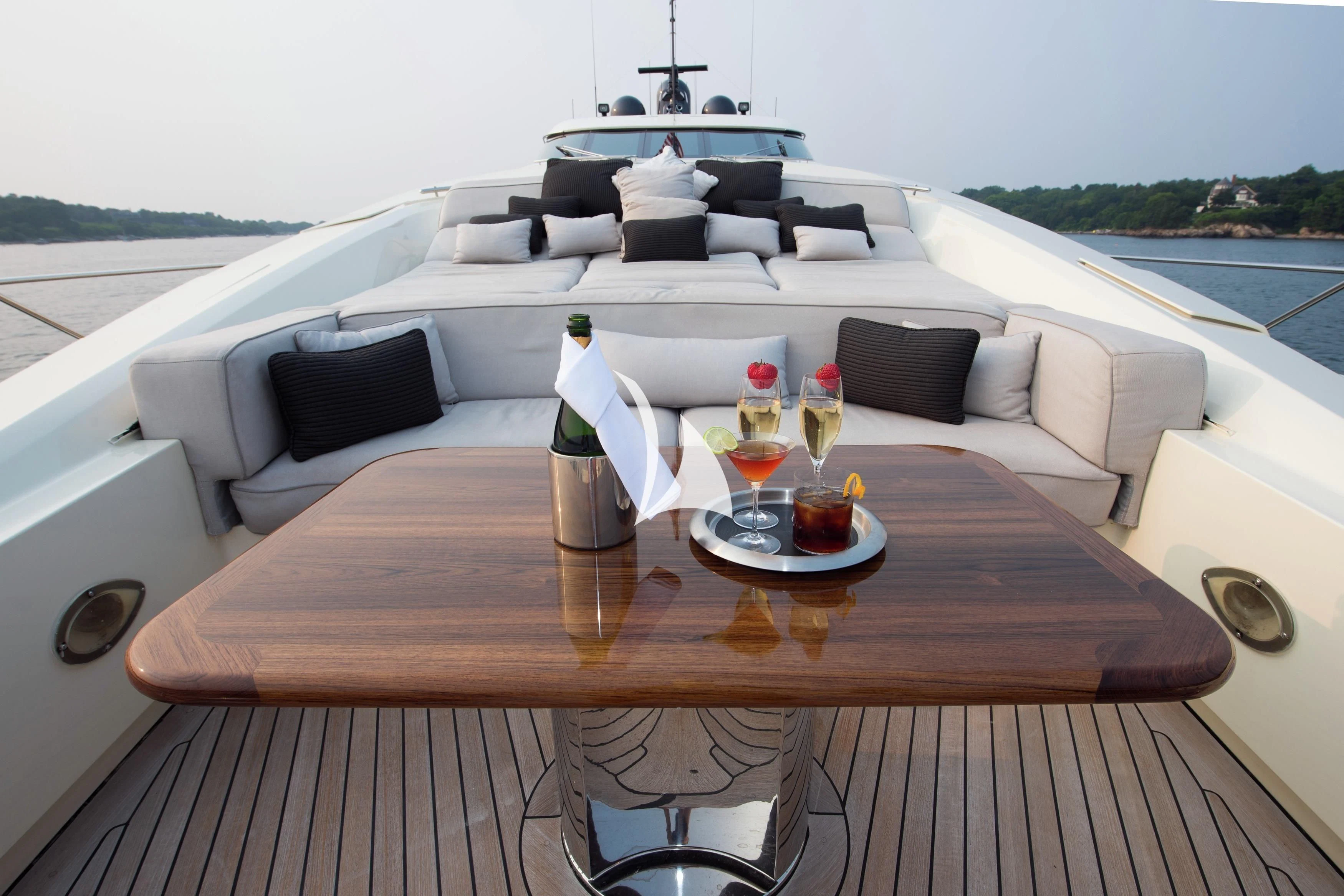 a table with drinks on it aboard STEALTH Yacht for Sale
