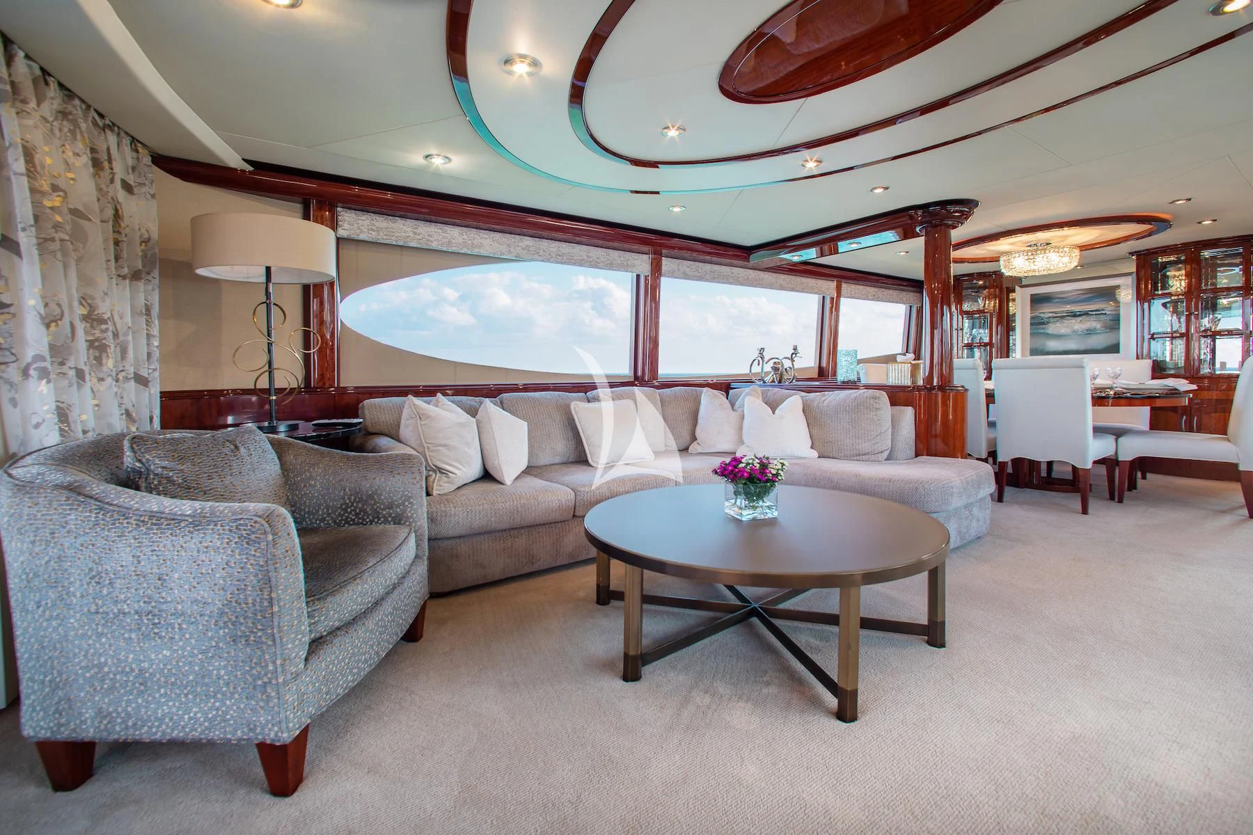 a living room with a large sofa aboard SUMMERWIND Yacht for Sale