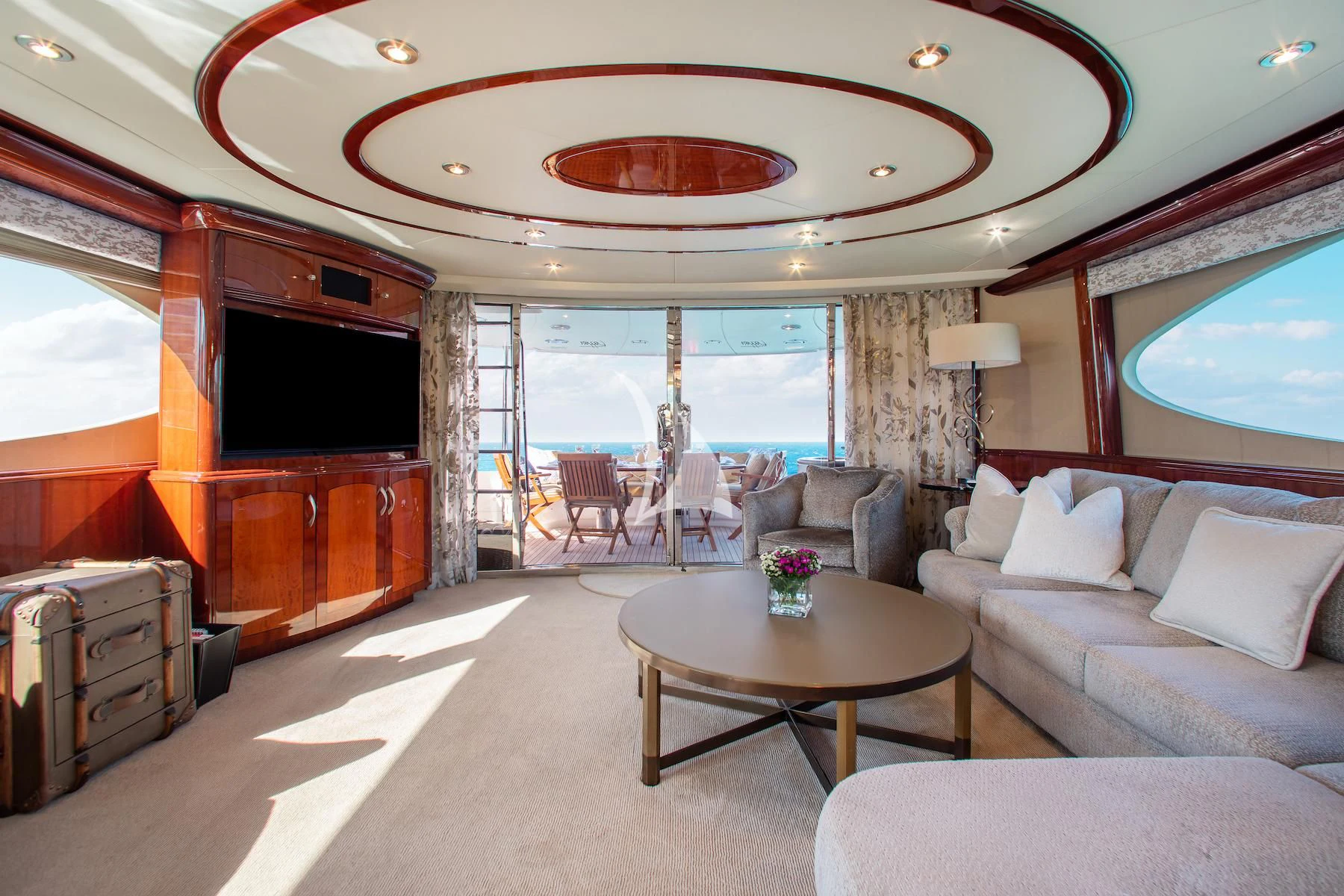 a living room with a large window aboard SUMMERWIND Yacht for Sale