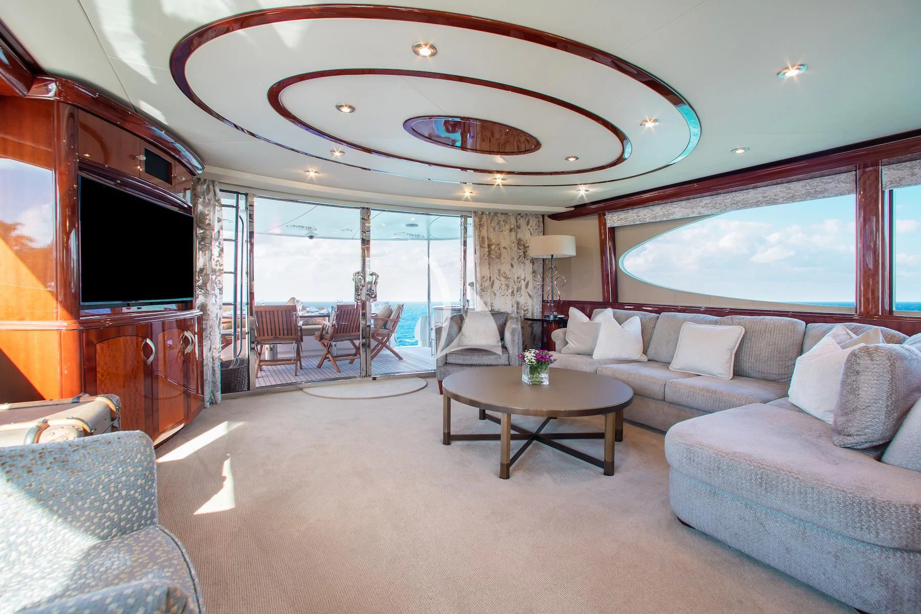 a living room with a large window aboard SUMMERWIND Yacht for Sale