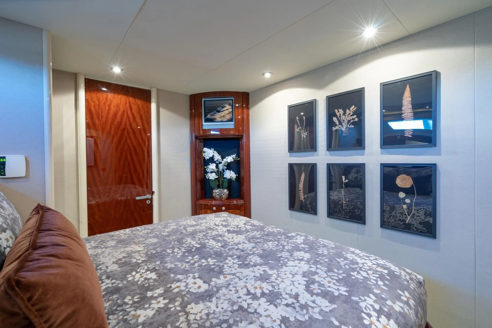 a bedroom with a bed and a mirror aboard SUMMERWIND Yacht for Sale