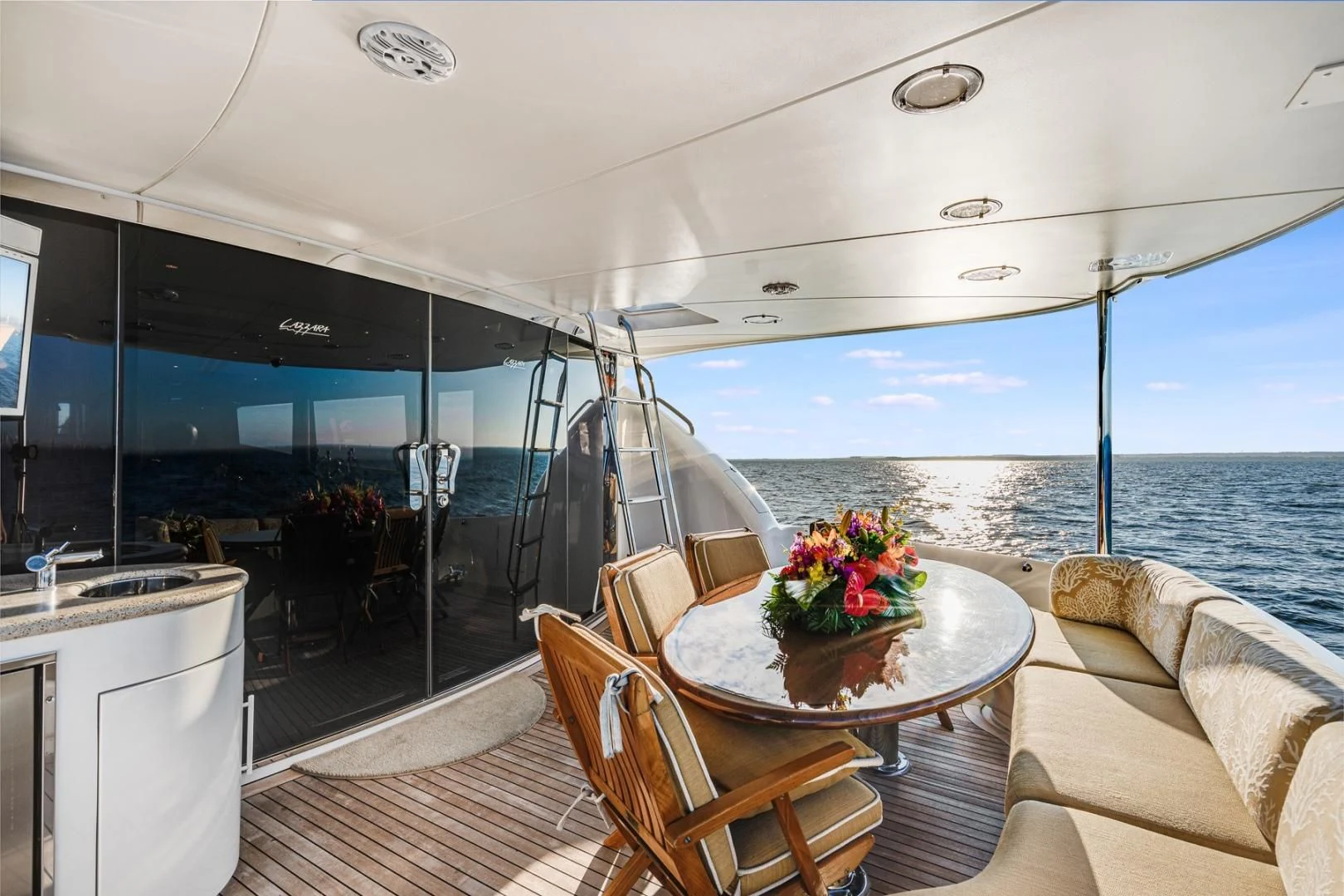 a boat with a table and chairs aboard SUMMERWIND Yacht for Sale