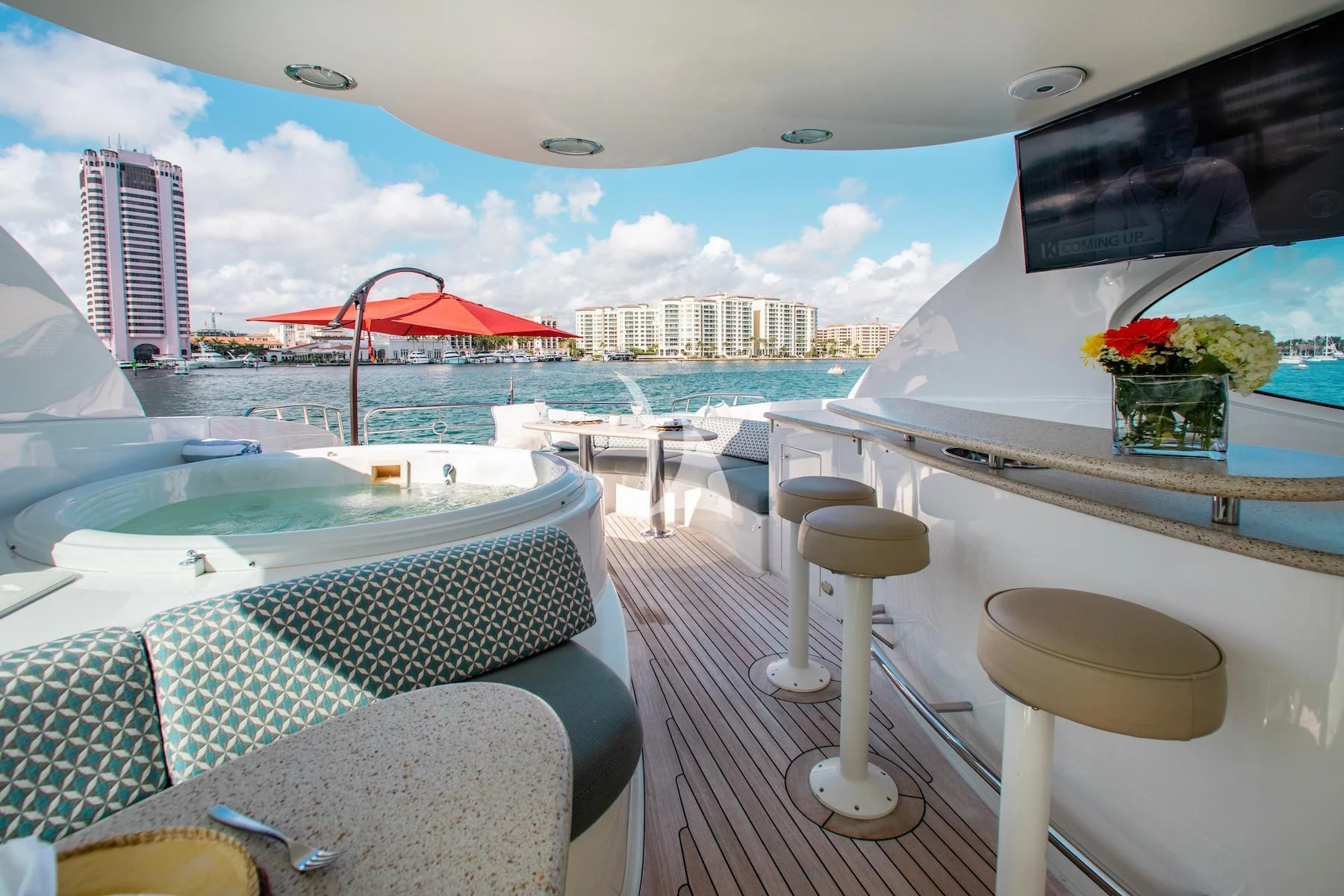 a room with a table chairs and a view of the water aboard SUMMERWIND Yacht for Sale