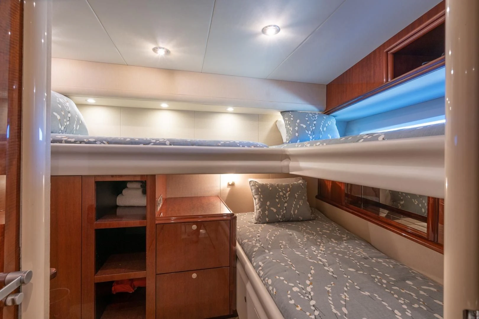 a bedroom with a bed and a desk aboard SUMMERWIND Yacht for Sale