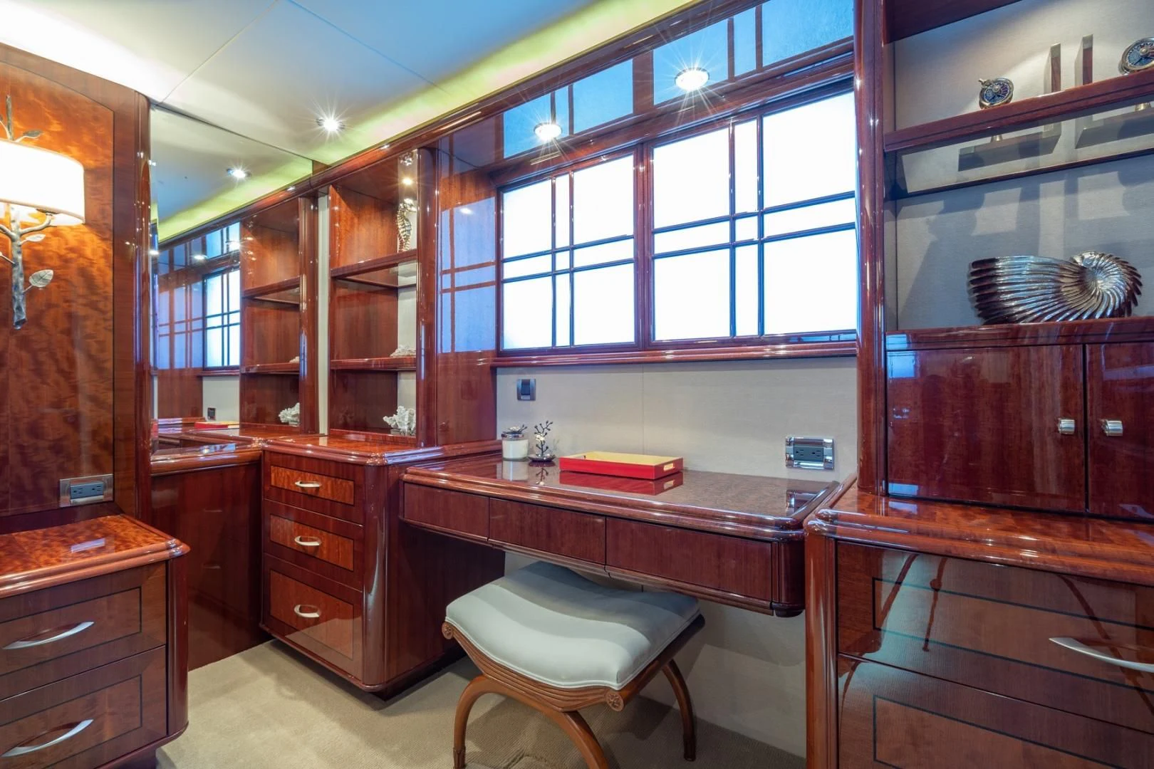 a kitchen with a counter and stools aboard SUMMERWIND Yacht for Sale