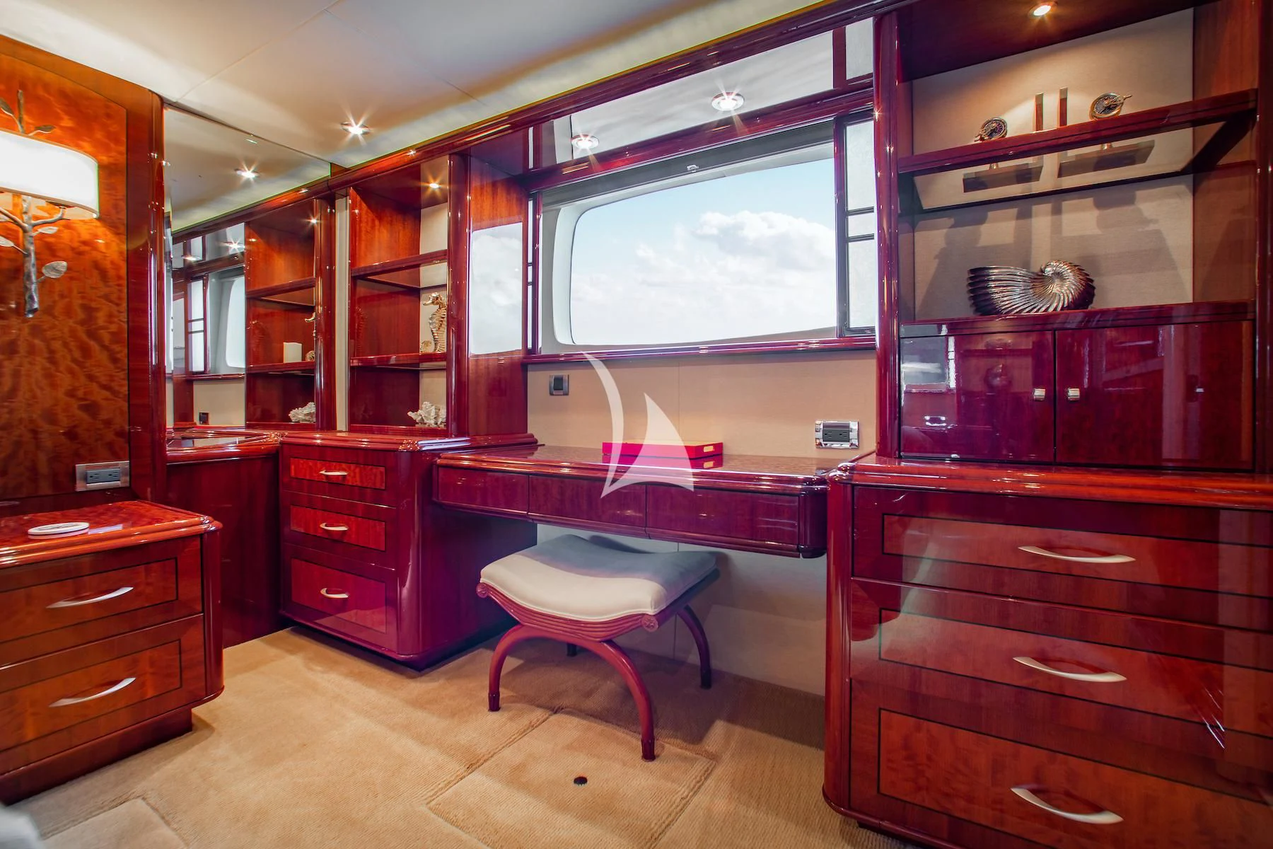 a kitchen with a red counter and cabinets aboard SUMMERWIND Yacht for Sale