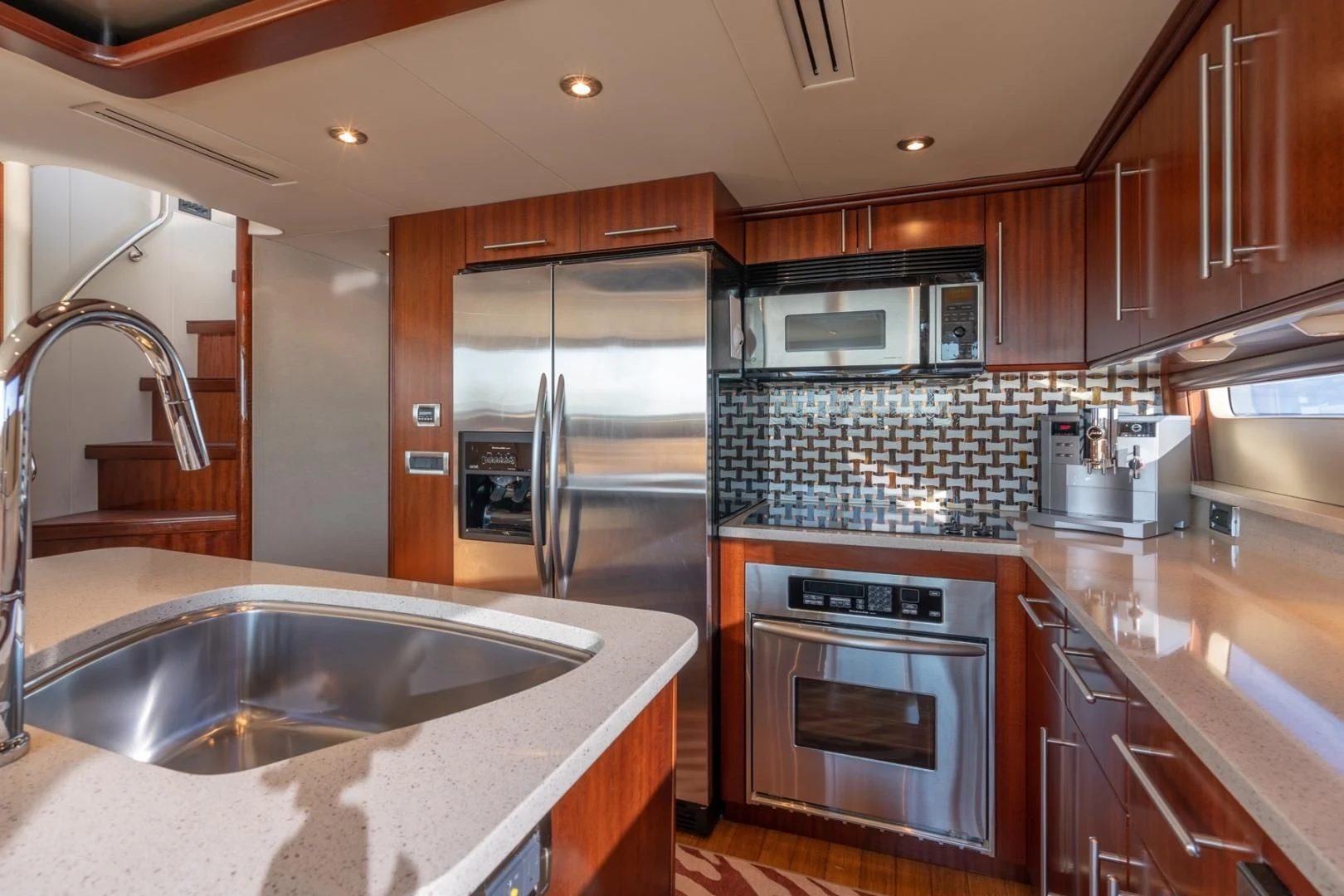 a kitchen with a sink and stove aboard SUMMERWIND Yacht for Sale