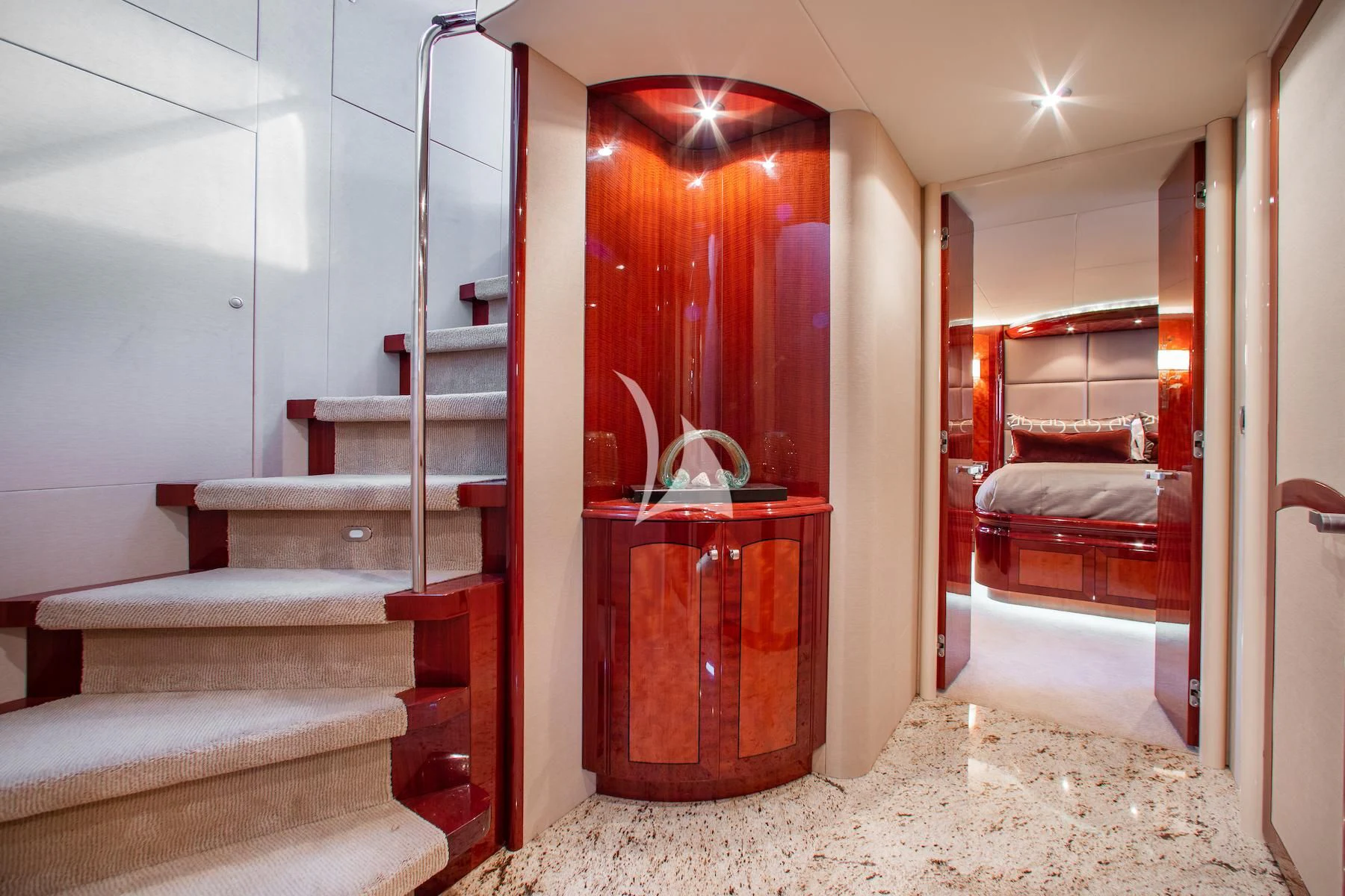 a room with a staircase and a red door aboard SUMMERWIND Yacht for Sale